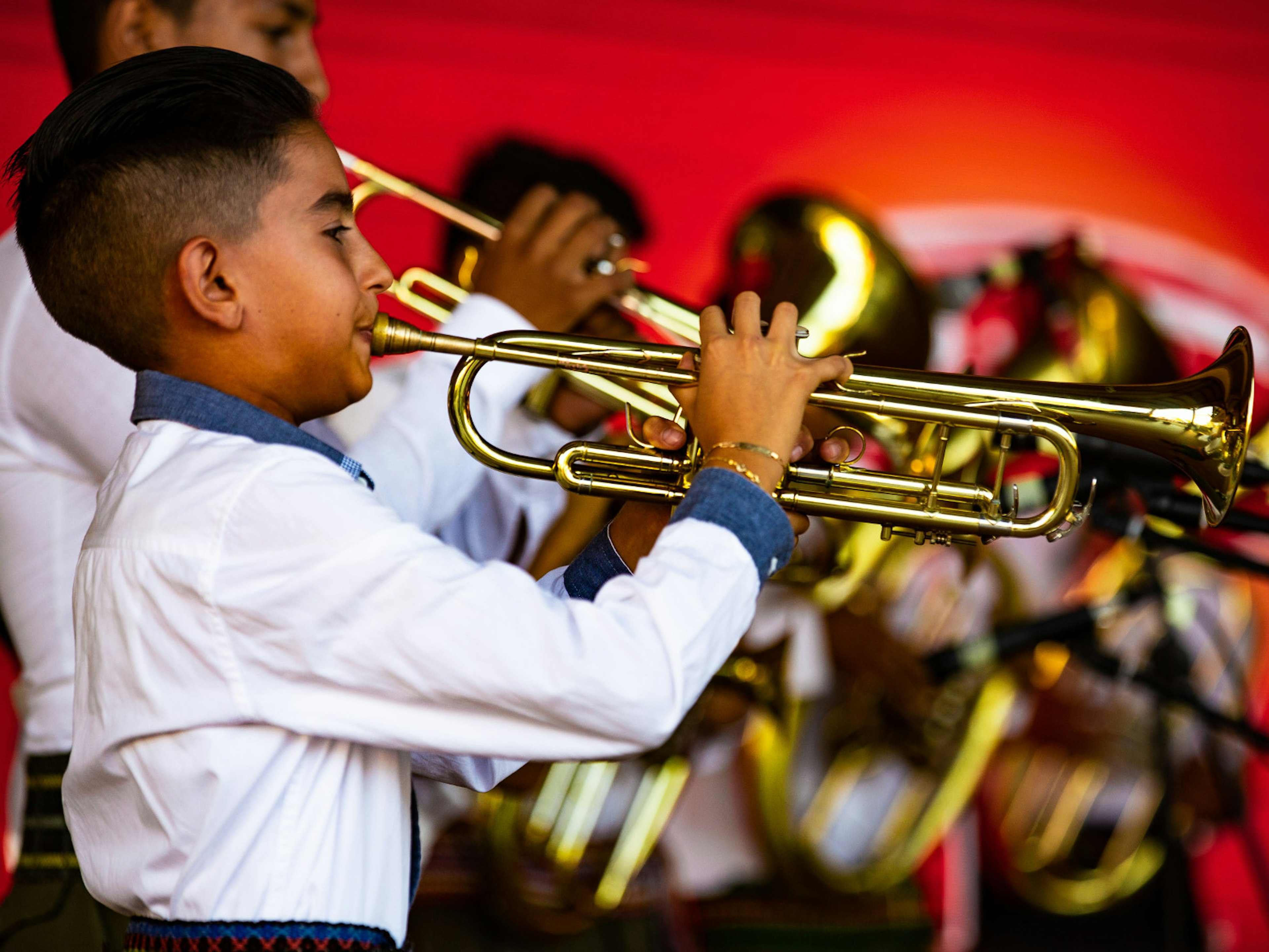 A young boy competes in the kids' competition at the Guča Trumpet Festival © Aleksandar Donev / Lonely Planet