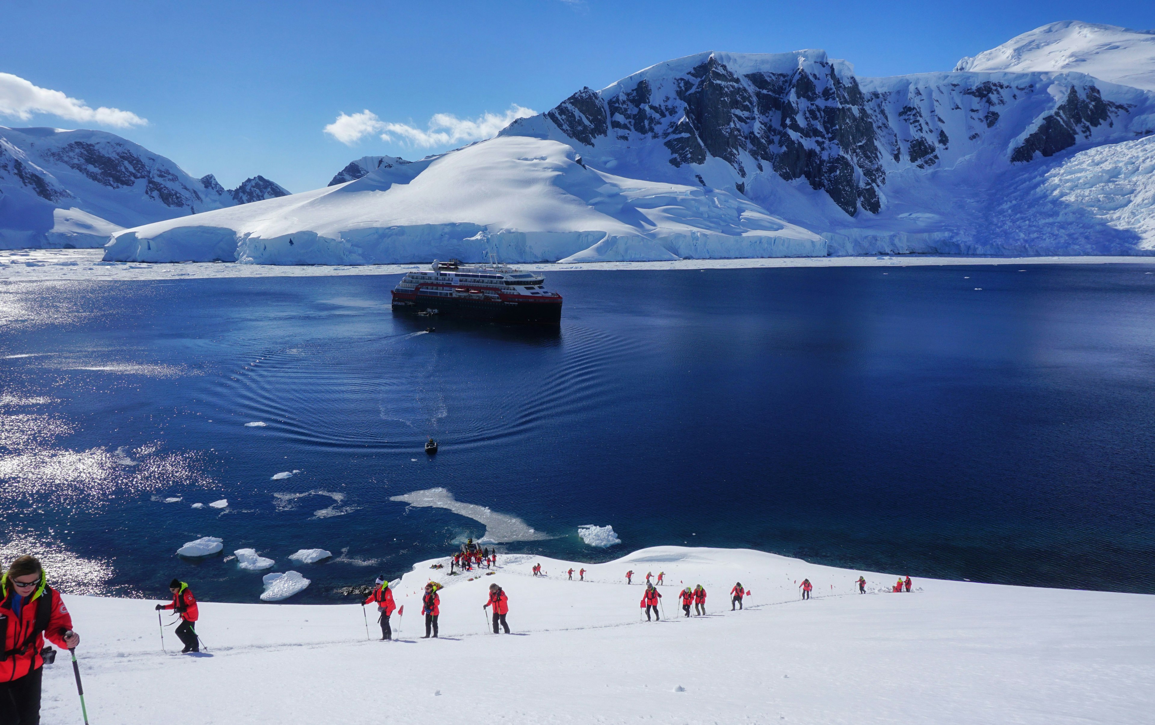 A view from a peak overlooking the Orne Harbour and Hurtigruten MS Roald Amundsen