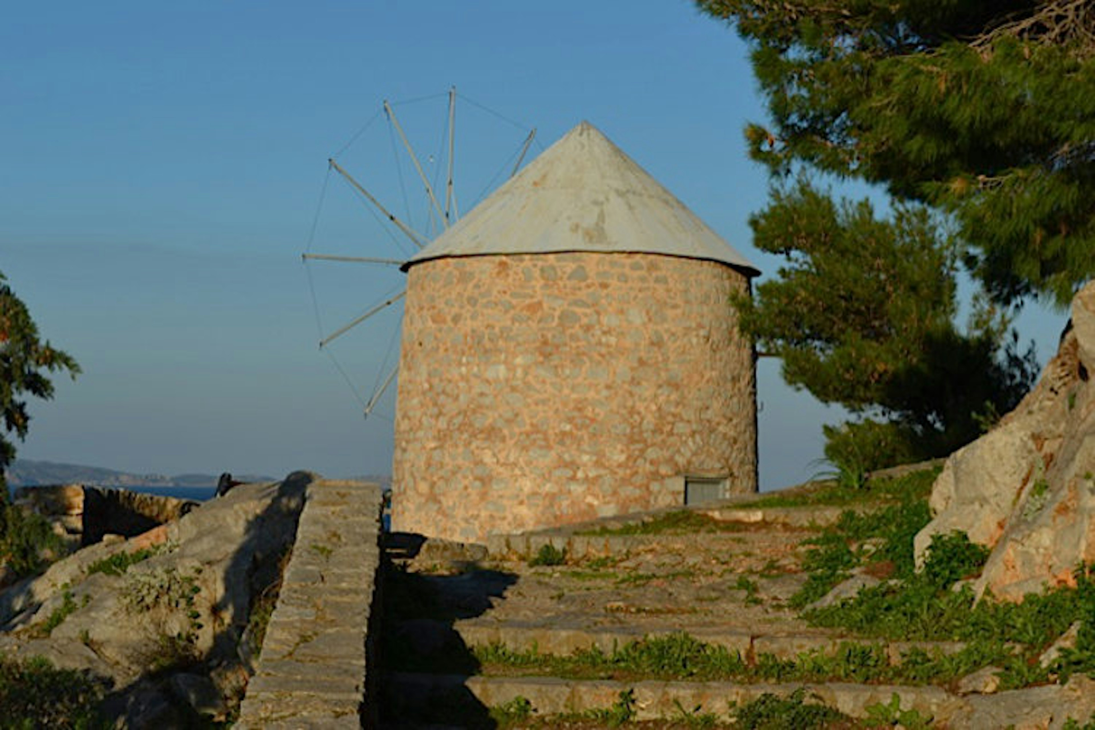 The seafront windmill in Hydra featured in Sophia Loren's Boy on a Dolphin. Image by Alexis Averbuck / Lonely Planet