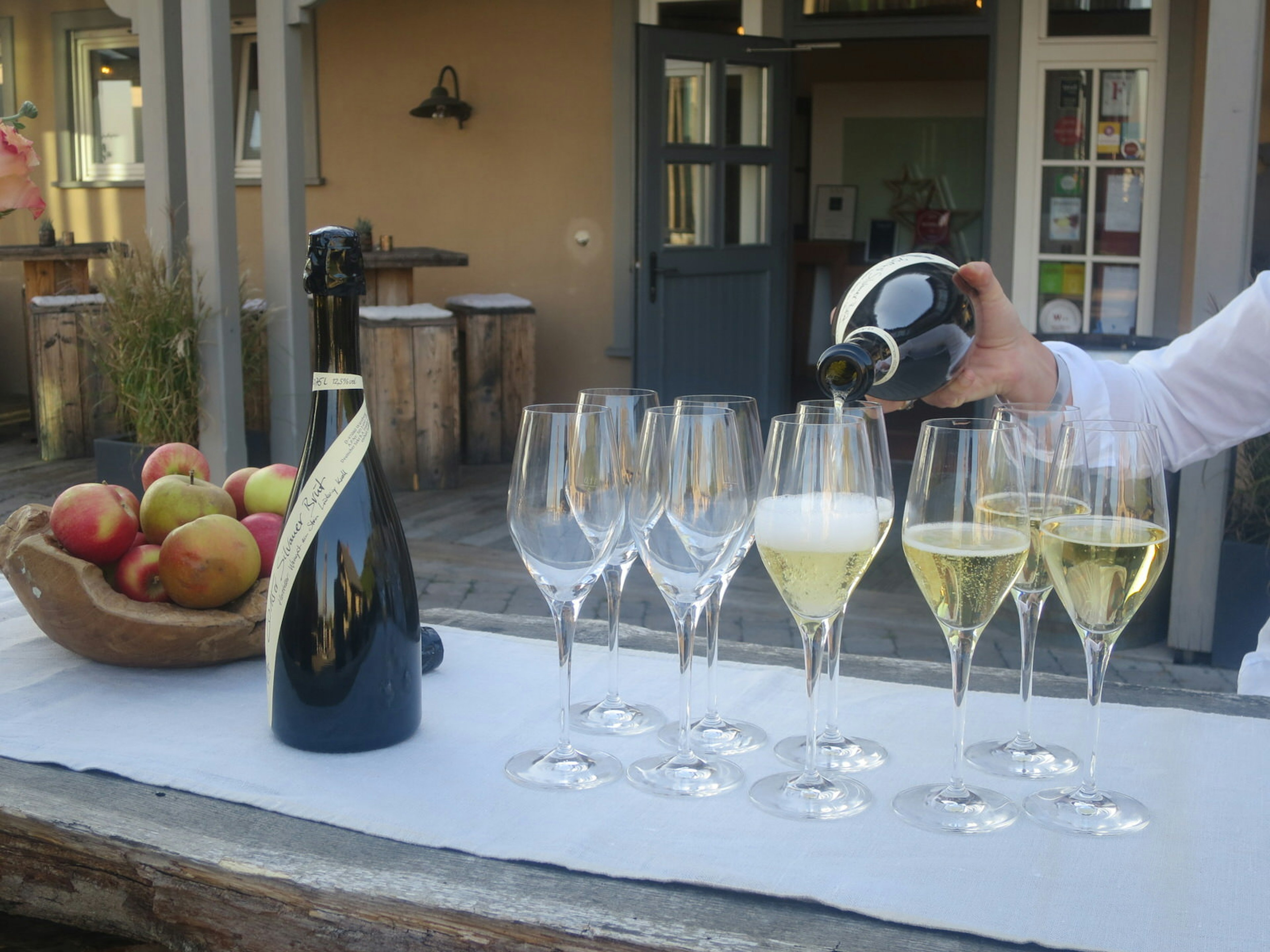 Pouring of the sparkling Silvaner Brut (using Franconian Silvaner and Pinot grapes) at Würzburg's organic, biodynamic Weingut am Stein