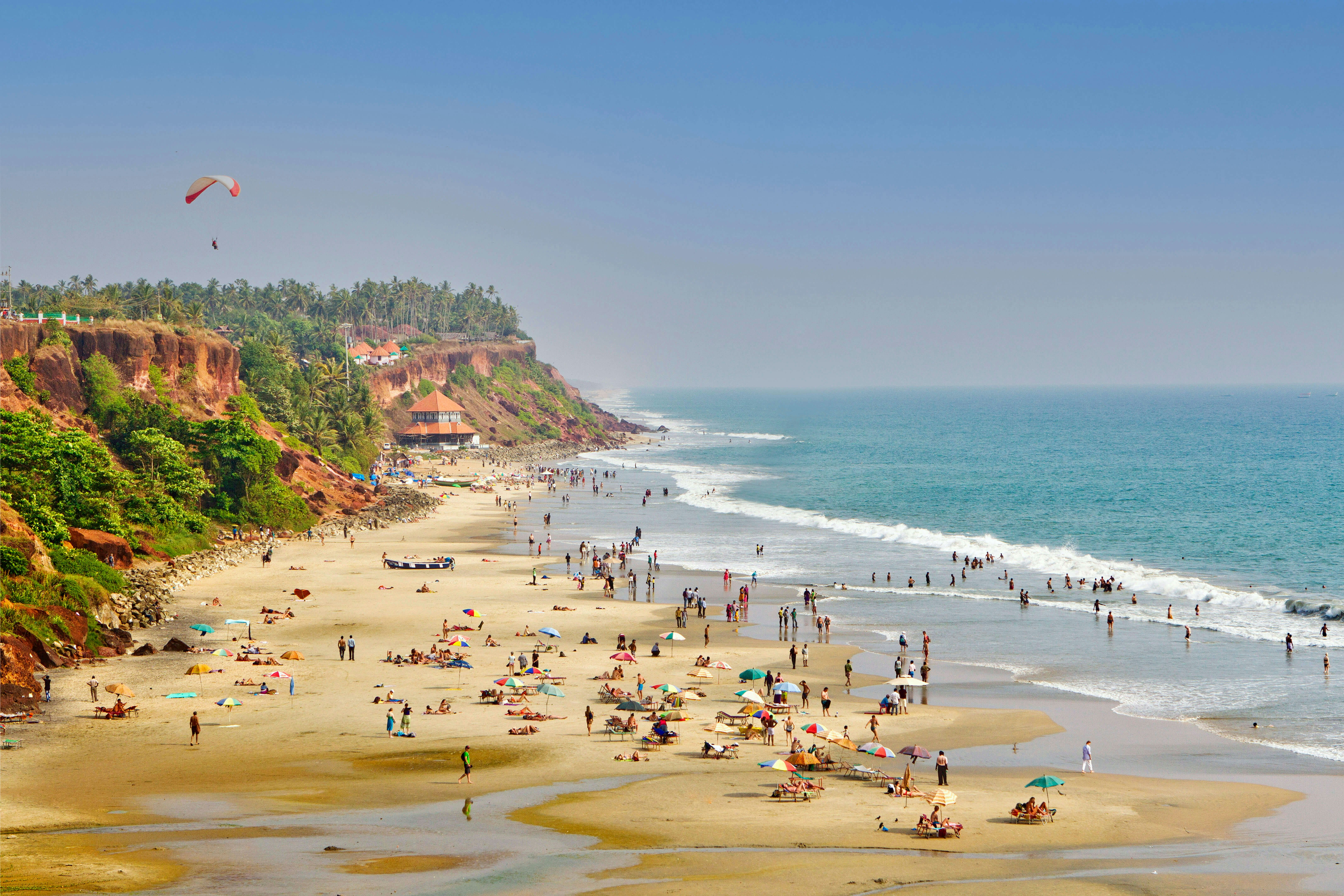 Backed by dramatic red cliffs, the beaches at Varkala are the center of Kerala’s burgeoning surfing scene. Shutterstock