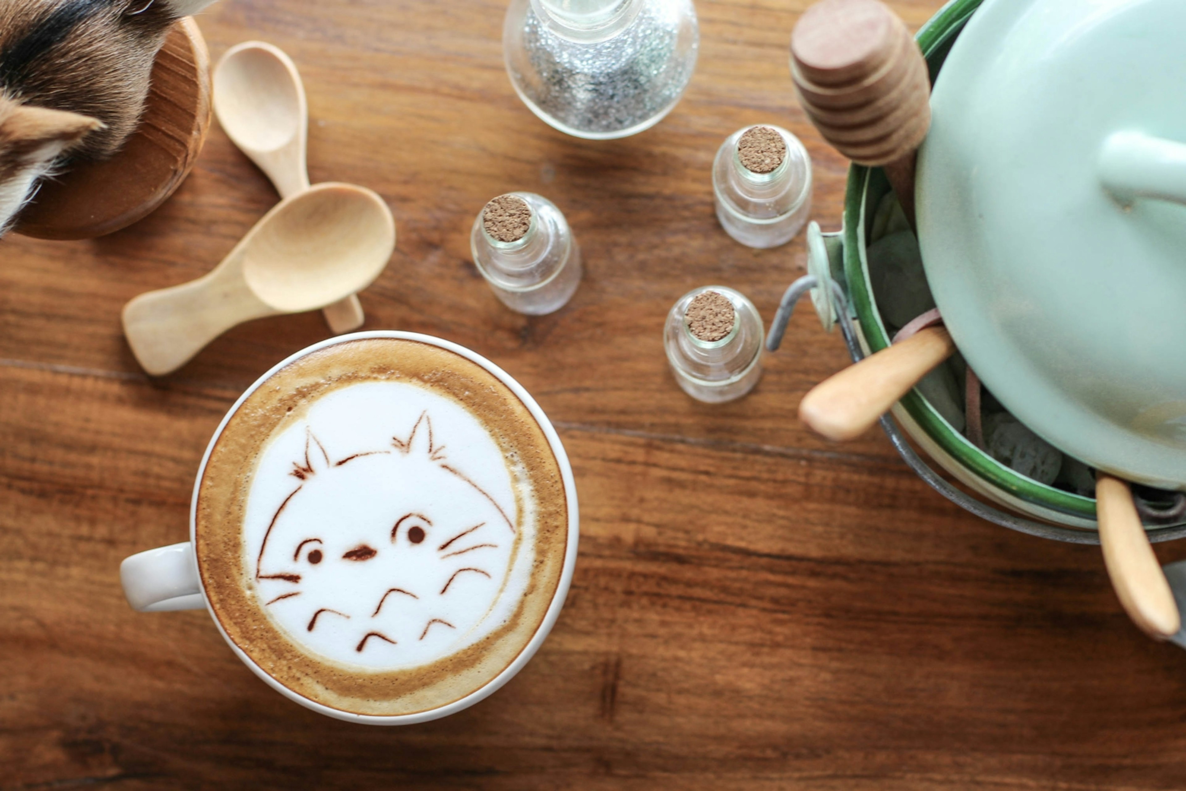 A woodland creature coffee design adorns a cup at Into the Woods in Chiang Mai