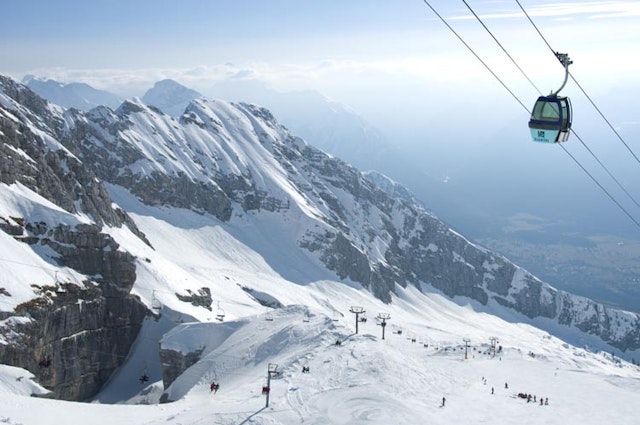 The Julian Alps tower above Slovenia's Kanin ski area. Steve Ogle/Getty Images