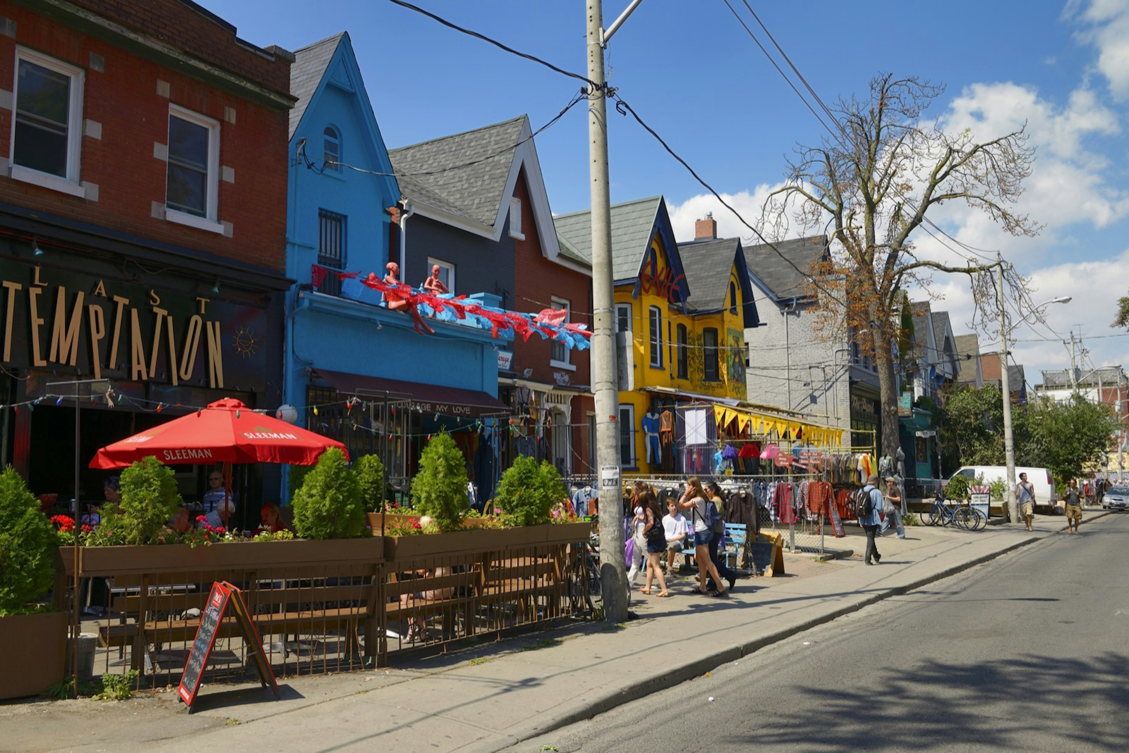 Colorful shops and buildings on Kensington Avenue Market in Toronto