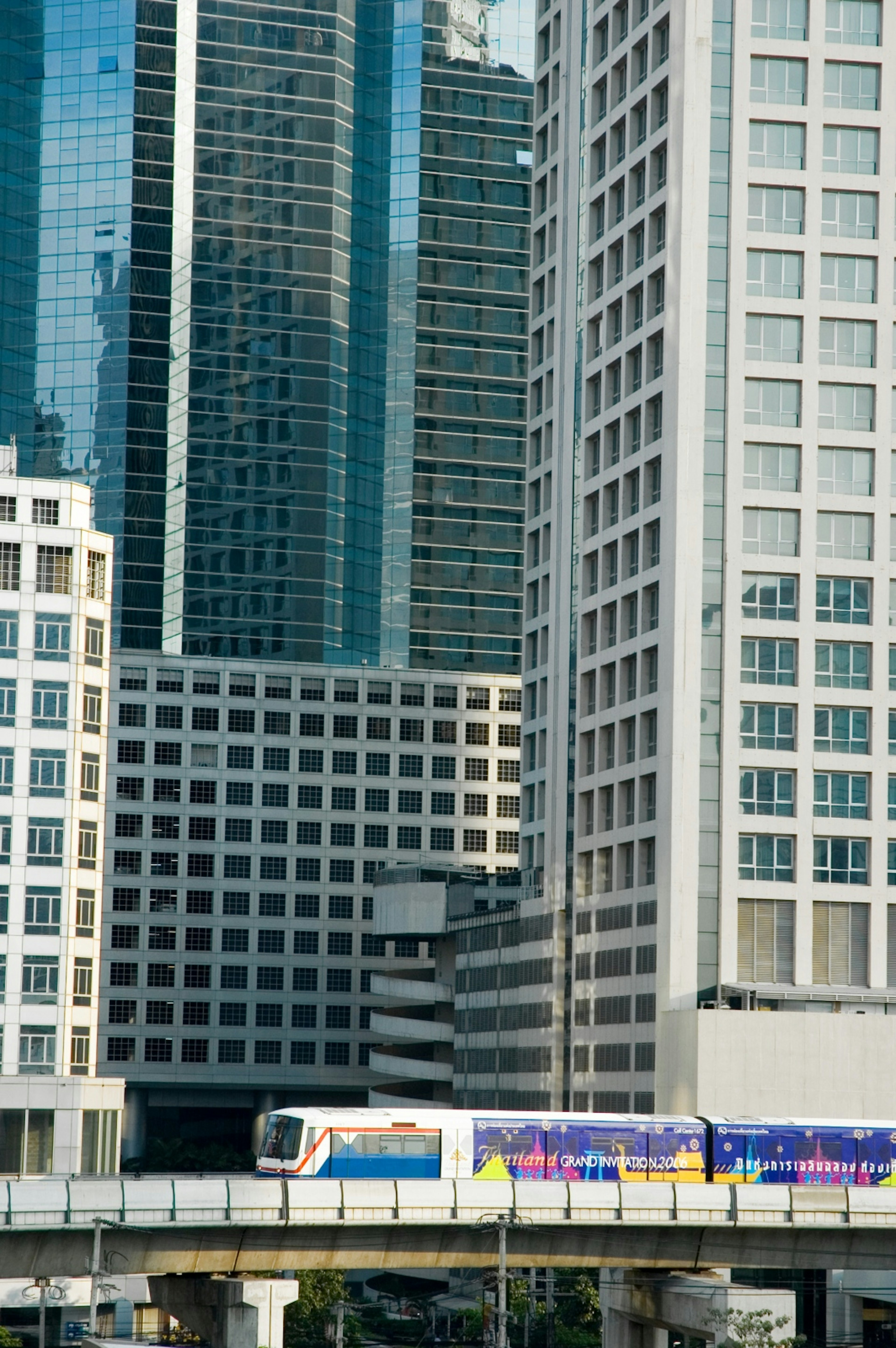 The BTS Skytrain weaving through city buildings in Bangkok © Mick Elmore / Lonely Planet