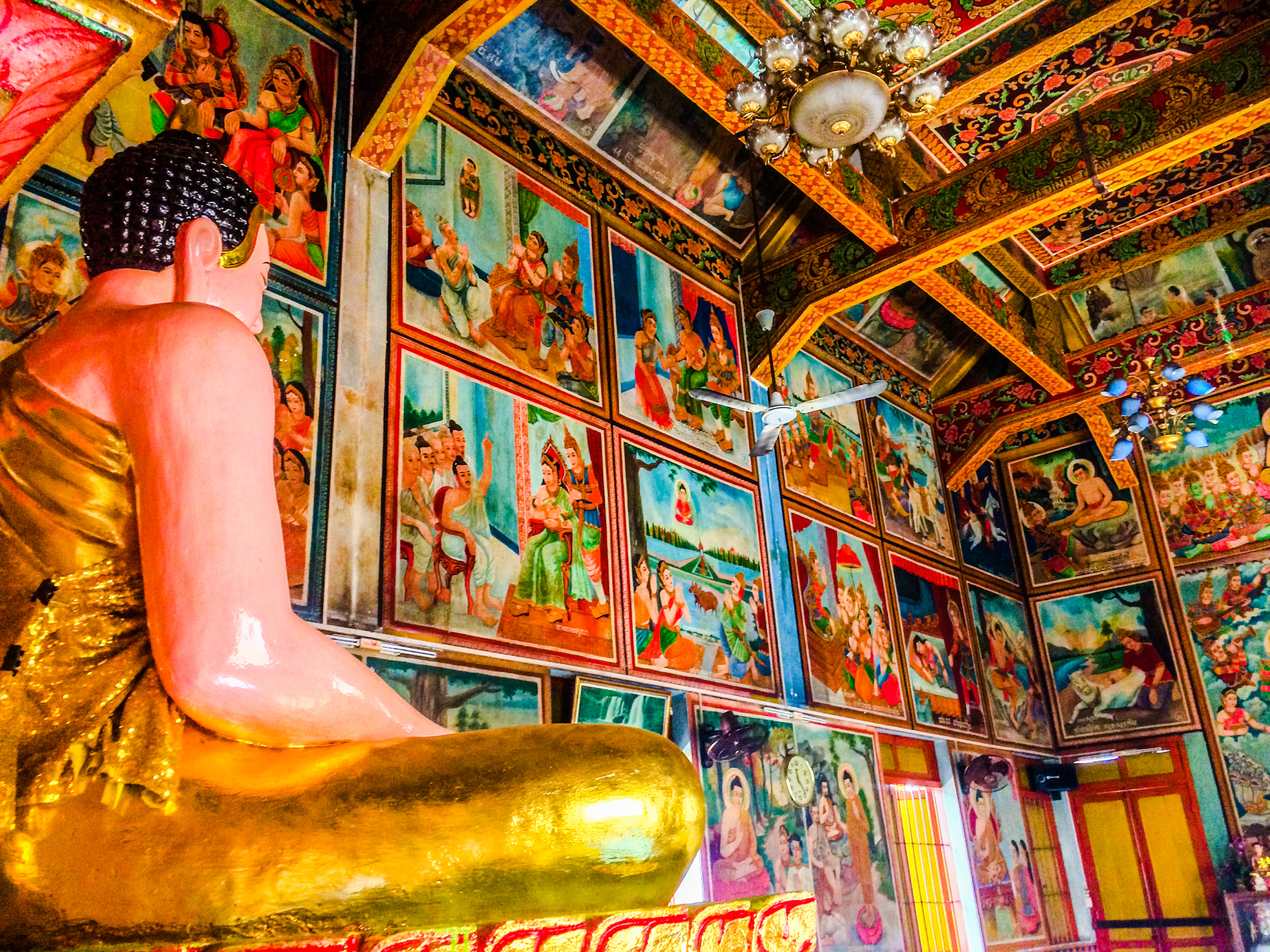 The walls and ceilings of Chantaransey Pagoda are covered in vivid murals. James Pham for Lonely Planet