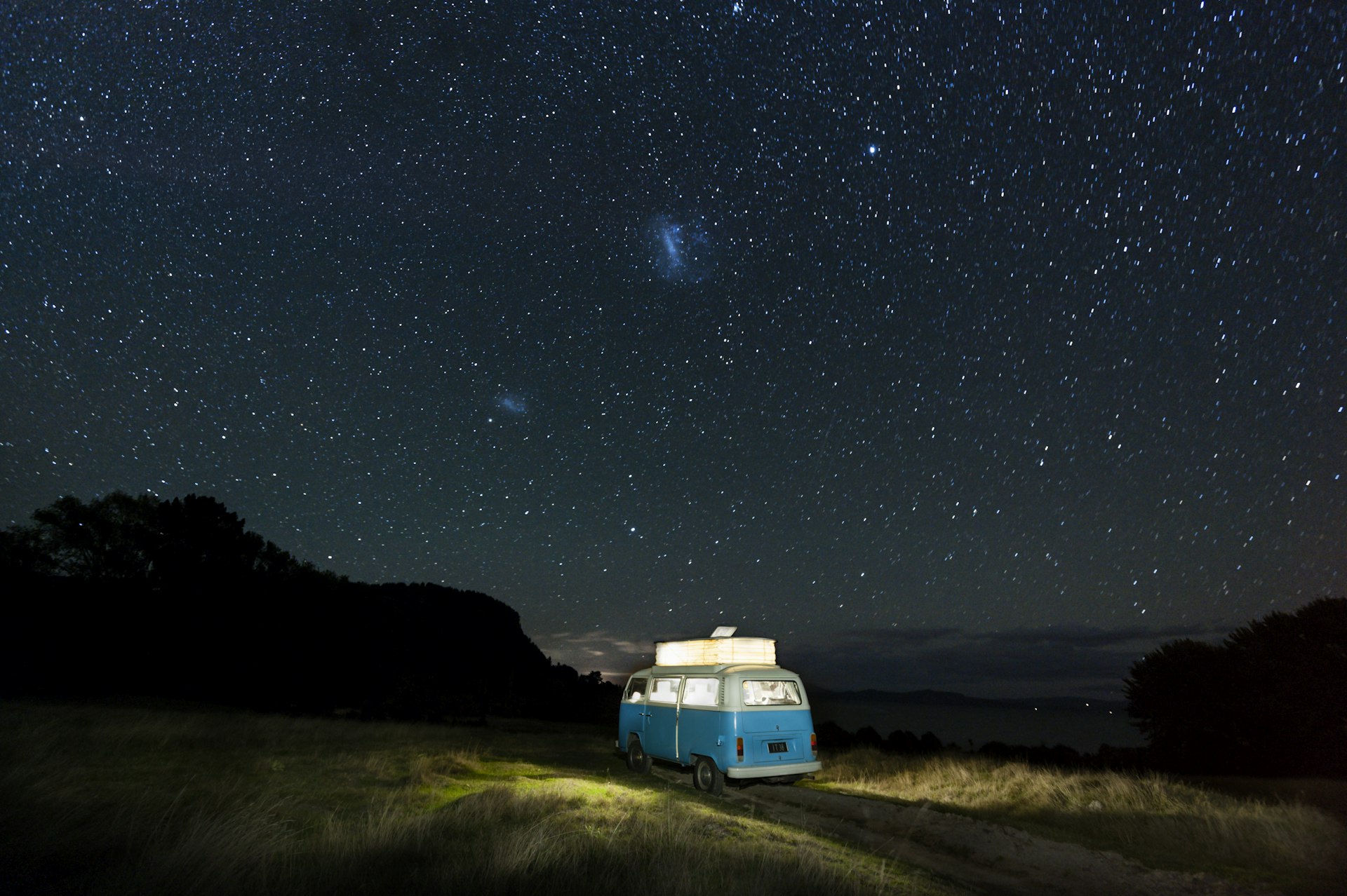 Campervan under a starry night in Lake Taupo, North Island, New Zealand 