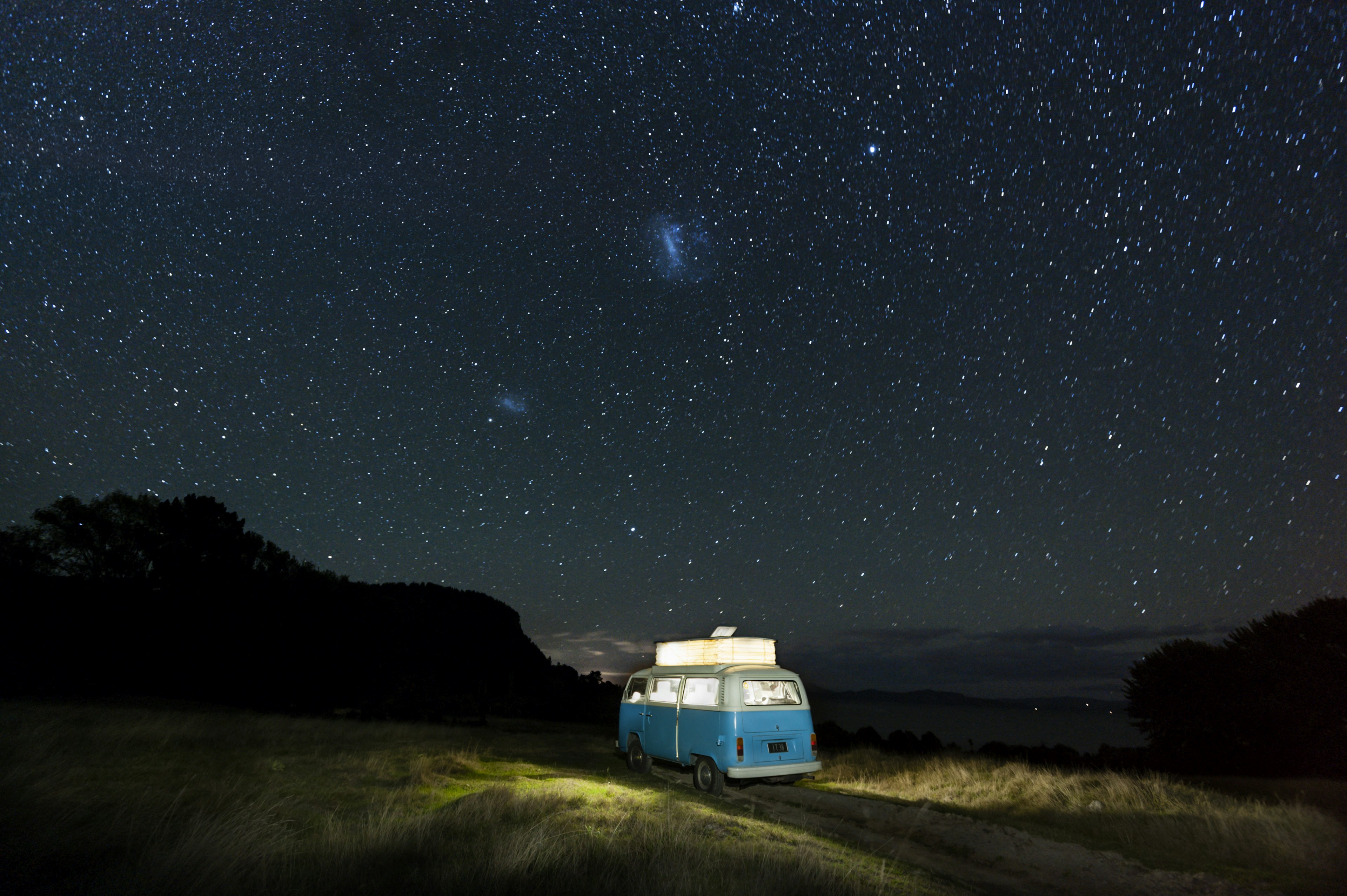 Campervan under a starry night in Lake Taupo, North Island, New Zealand