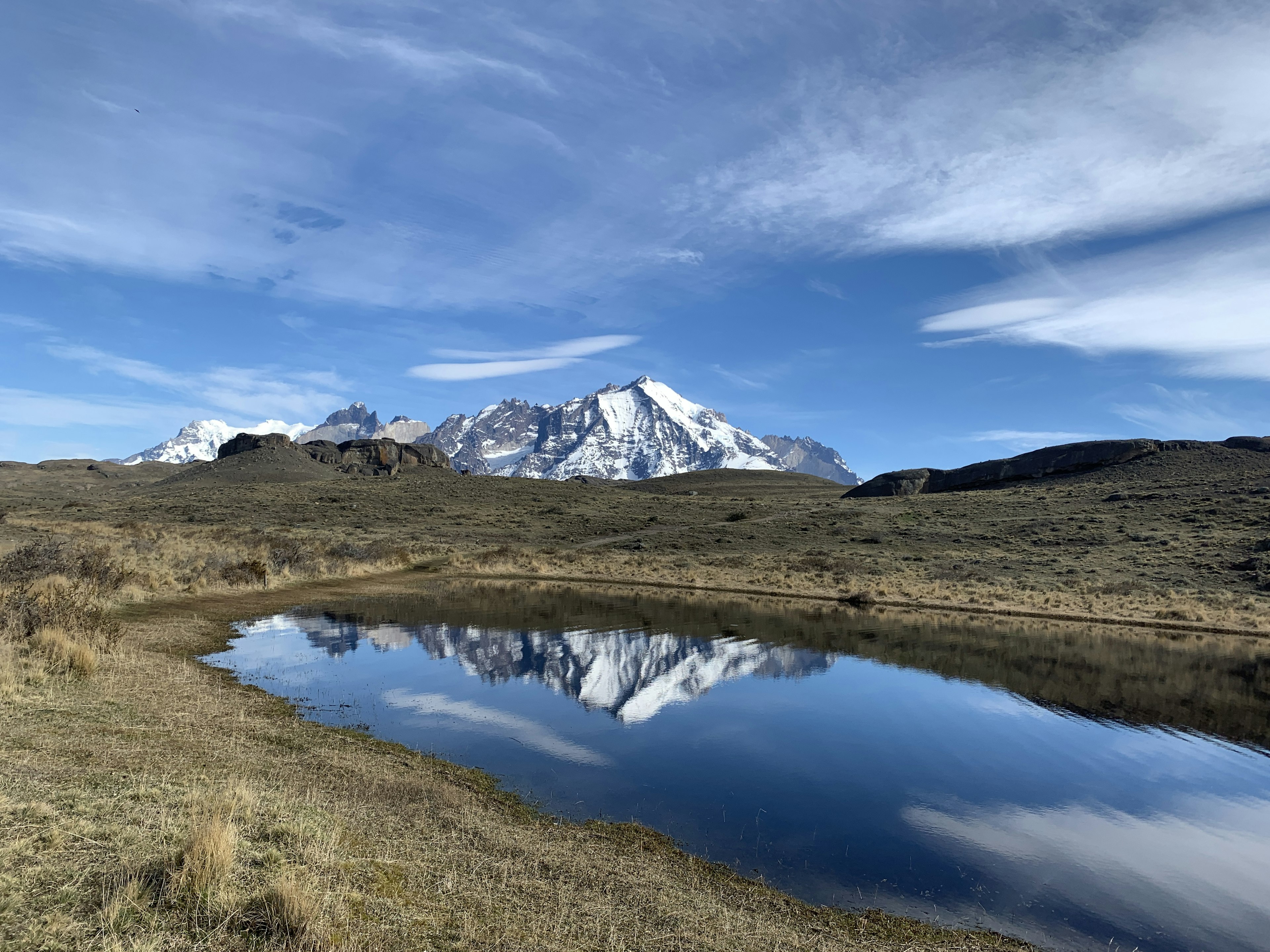 Snowy peaks and a small lake.JPG