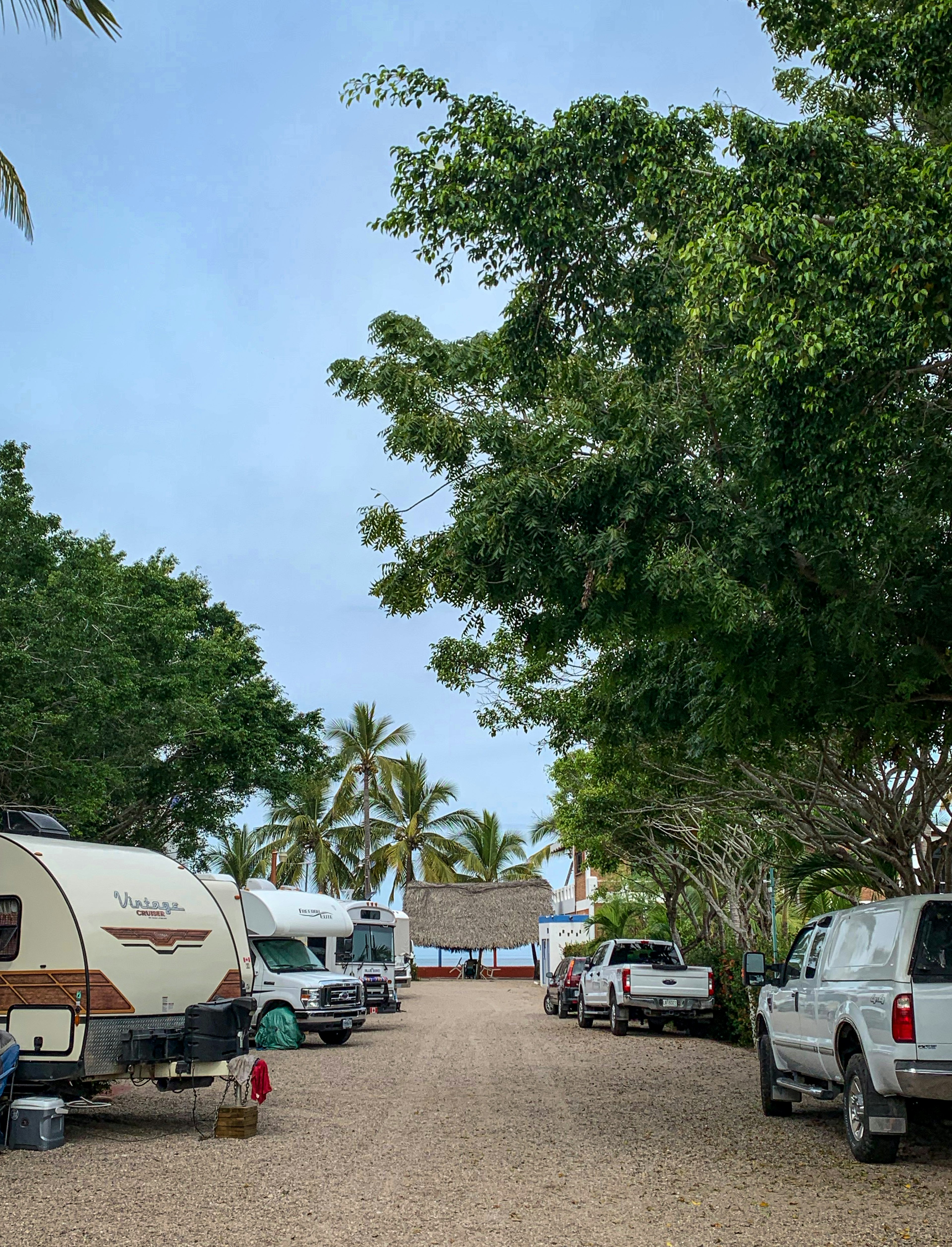 RVs parked near a beach