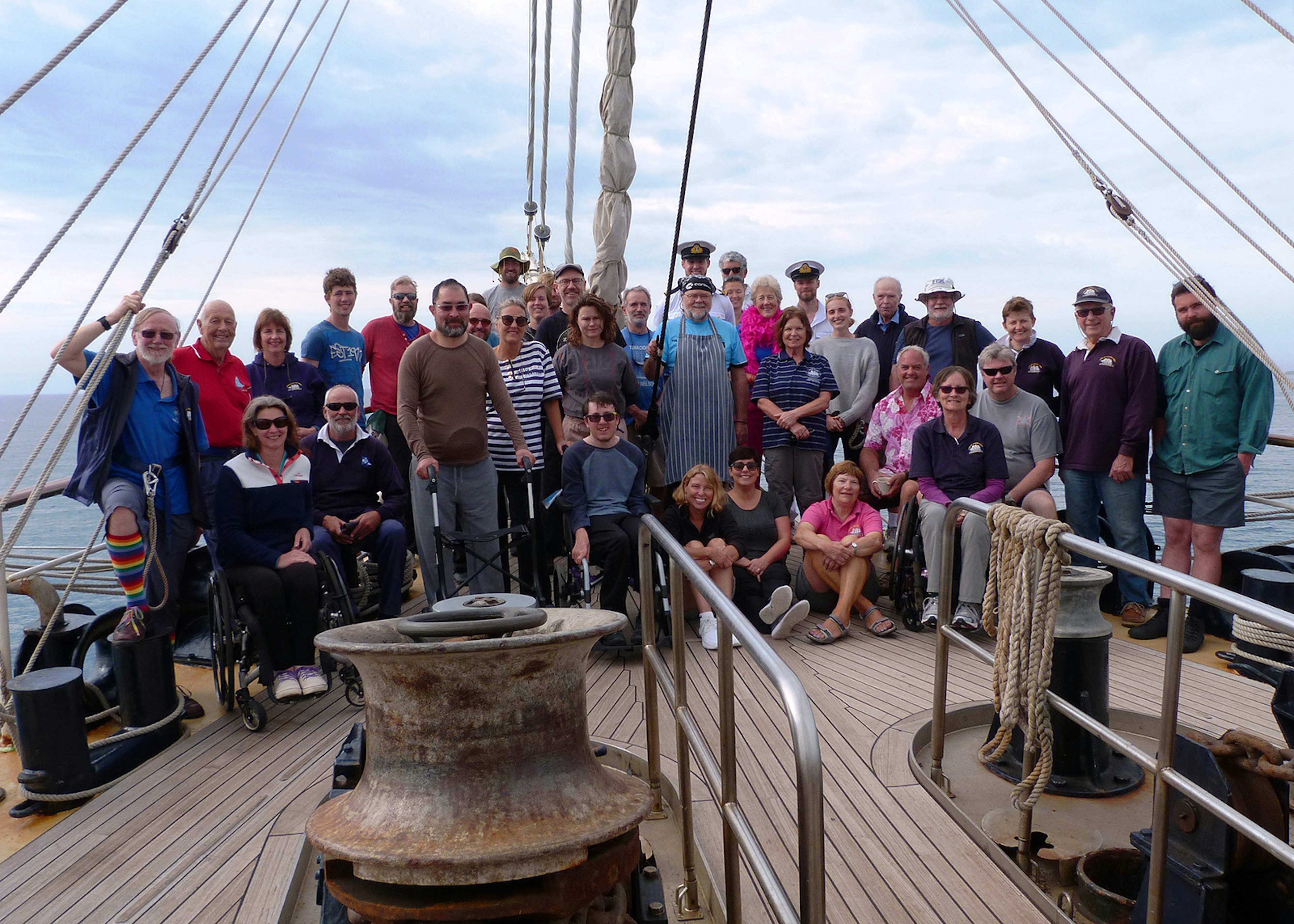 The crew of the SV Tenacious enjoying its 500th voyage