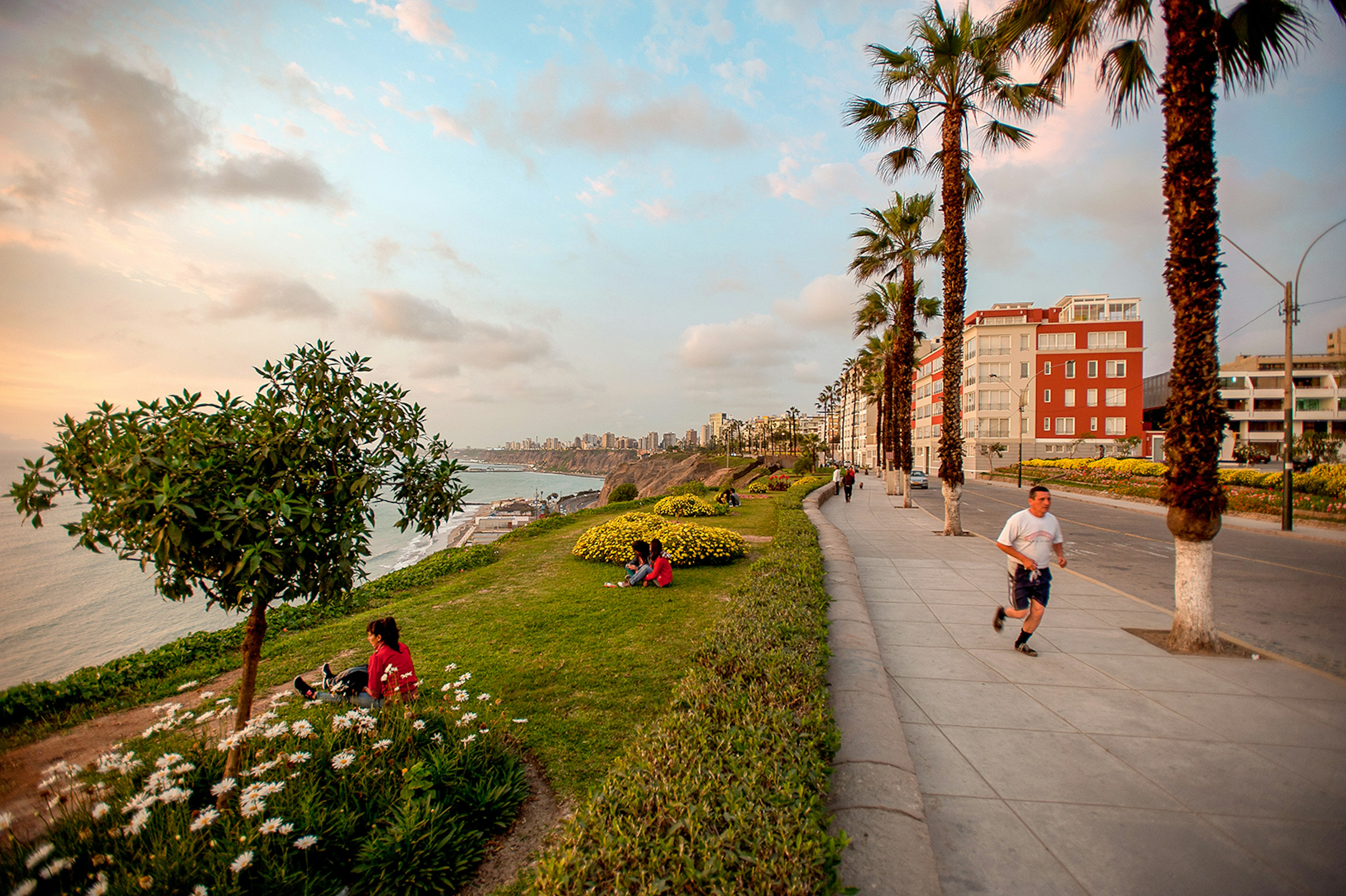 Man runs on waterfront promenade