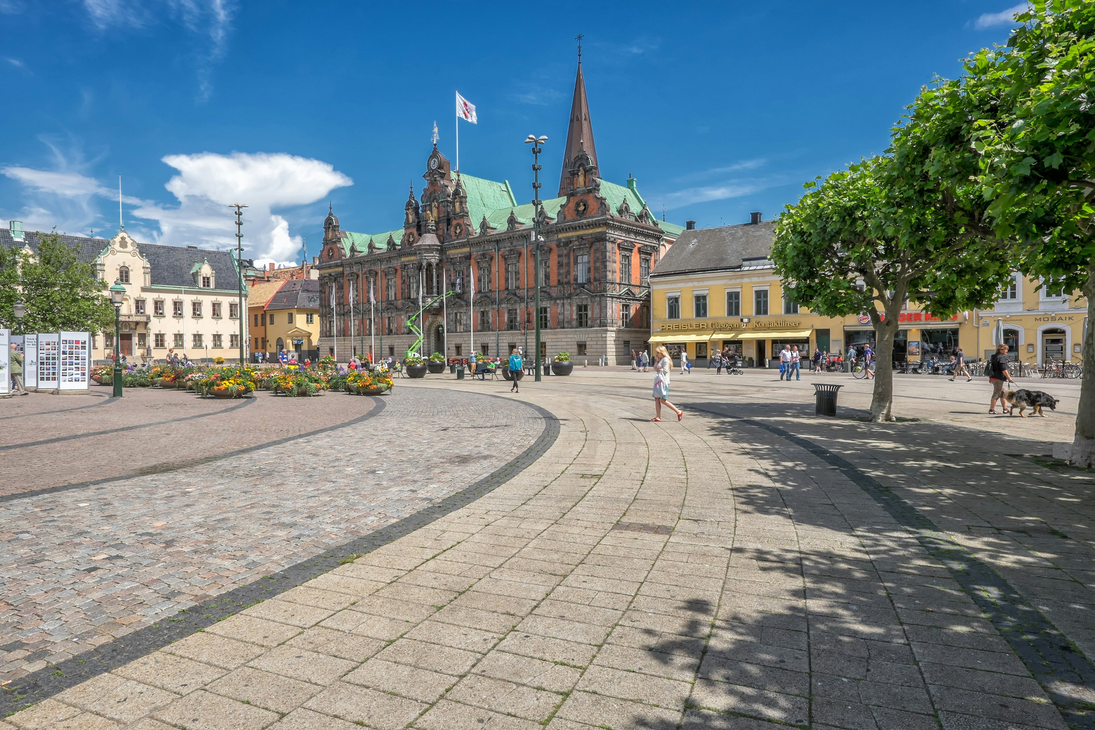 Malmo, Sweden – July 2, 2014: People stroll the big square in Malmo in front of the old city hall on a sunny summer day. The square in Sweden’s third largest city dates back to the 16th century and is a popular tourist attraction.
501738157
Malmo, Nordic Countries, Travel, Tourism, Scandinavian Culture, Building Exterior, Swedish Culture, Stortorget, Cobblestone, Old Town, Town Hall, History, Old, Cultures, Famous Place, Architecture, Urban Scene, Tourist, People, Skane, Sweden, Scandinavia, Flower, Summer, House, Town Square, Built Structure, City, Flag