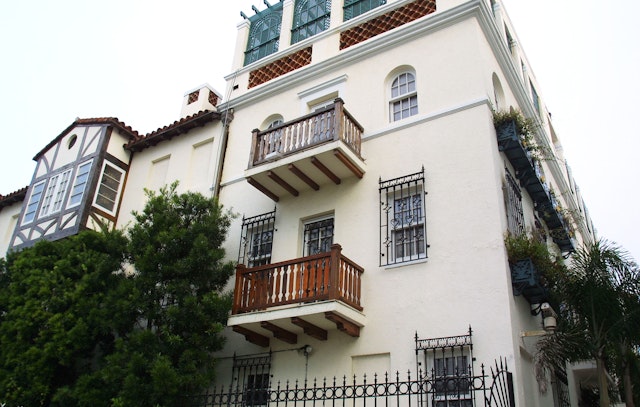 Looking up at the Mediterranean Revival facade of the former Versace Mansion in Miami's South Beach district