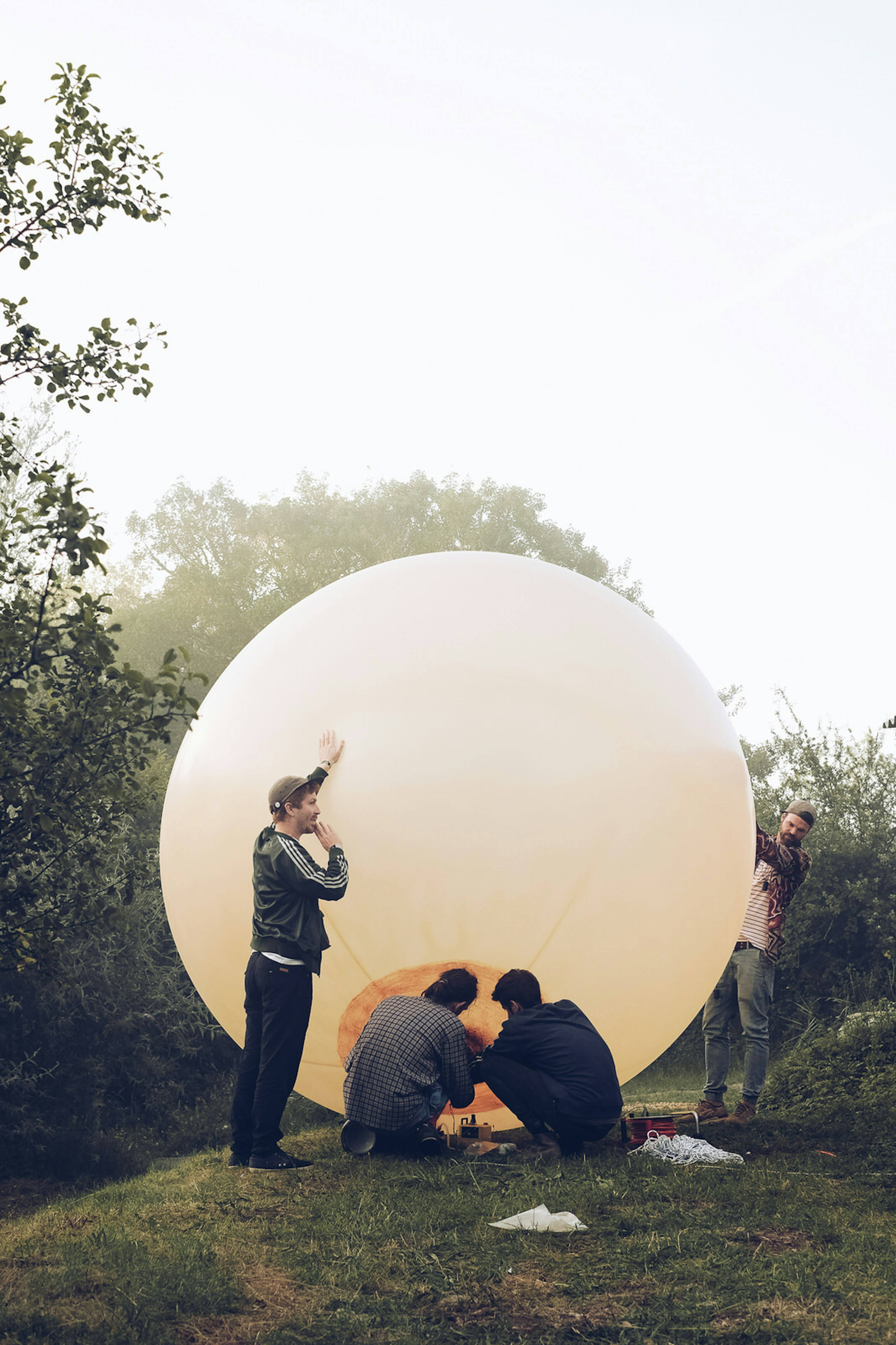 Europe music festival - people gather around a huge paper lantern at Monticule festival in Causses du Quercy Natural Regional Park © Monticule / Monnier Ostermair