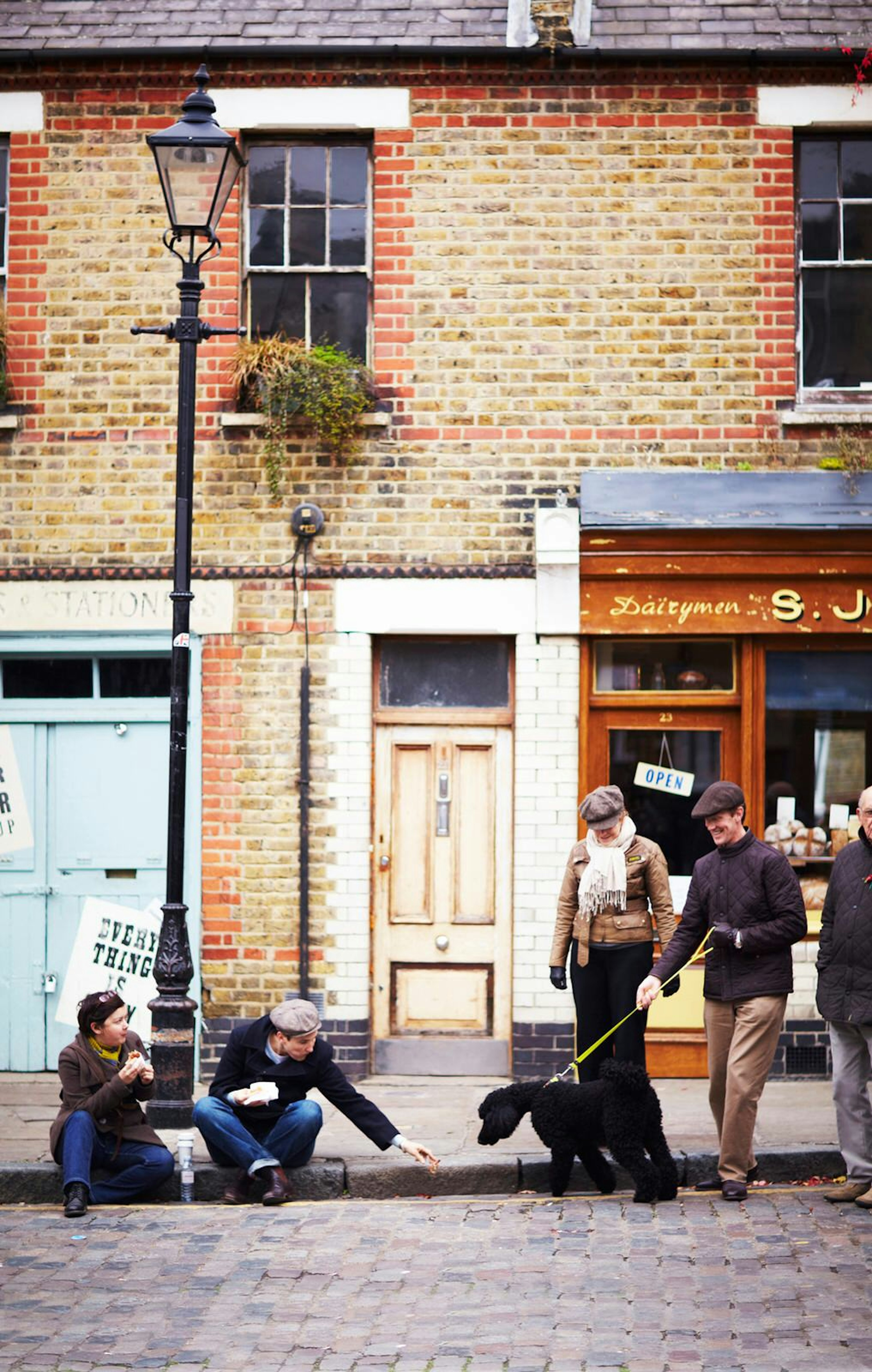 People and a dog on east London's Columbia Road