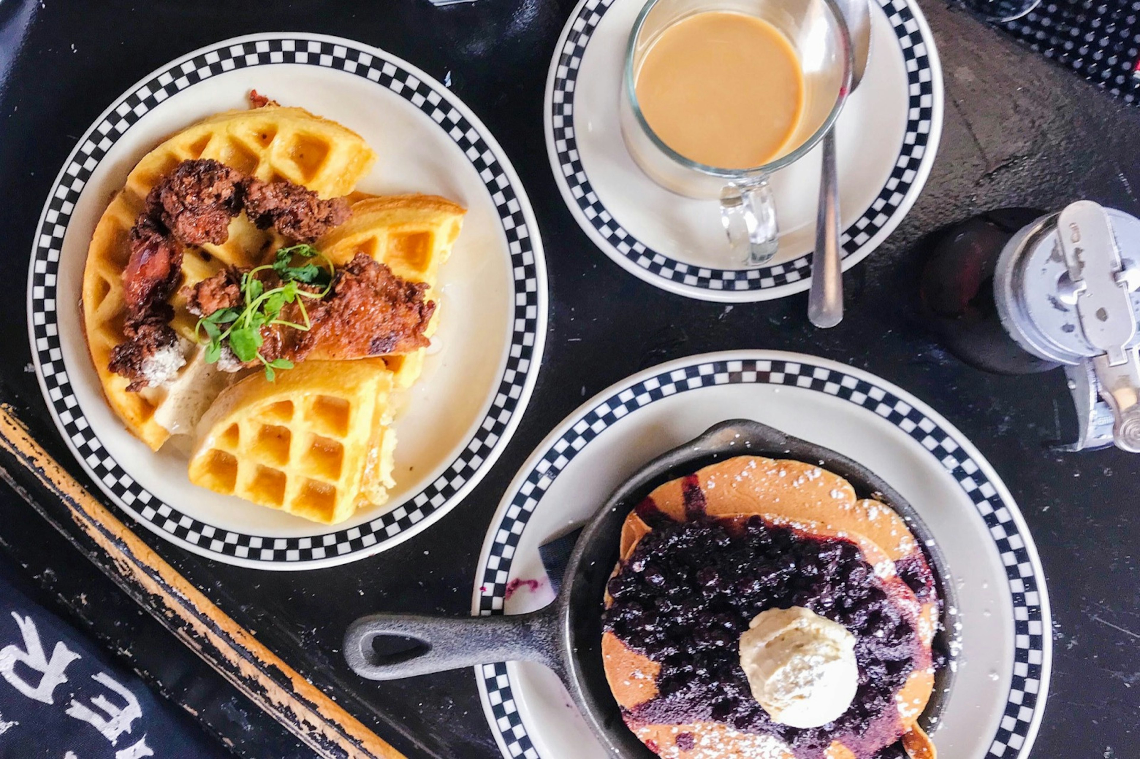 Looking down on a table covered in different brunch foods in Toronto