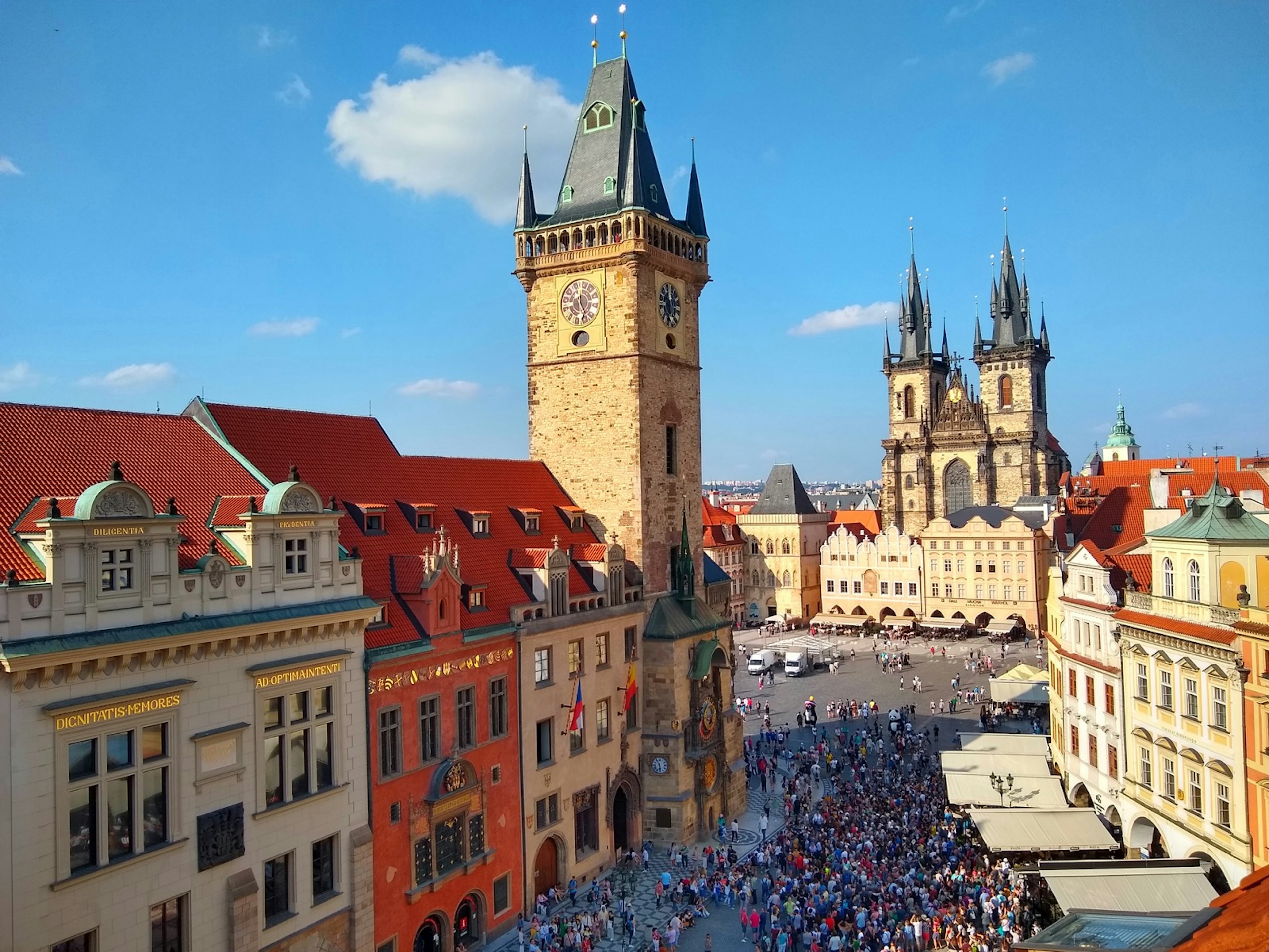 The black spires on several churches and clock towers mark the square in the Old Town neighborhood of Prague