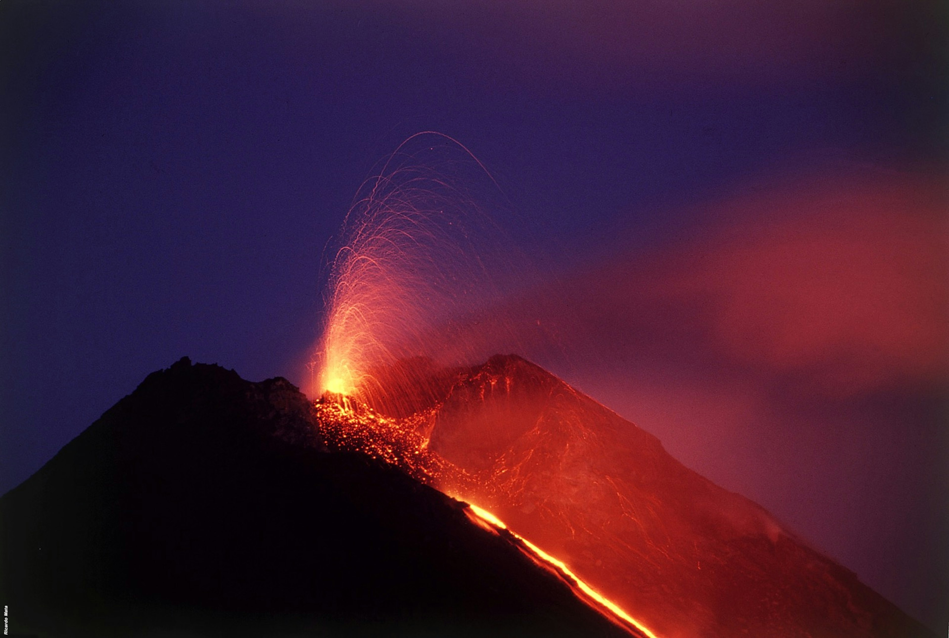 Red-hot, molten lava spews from Pacaya Volcano in Guatemala