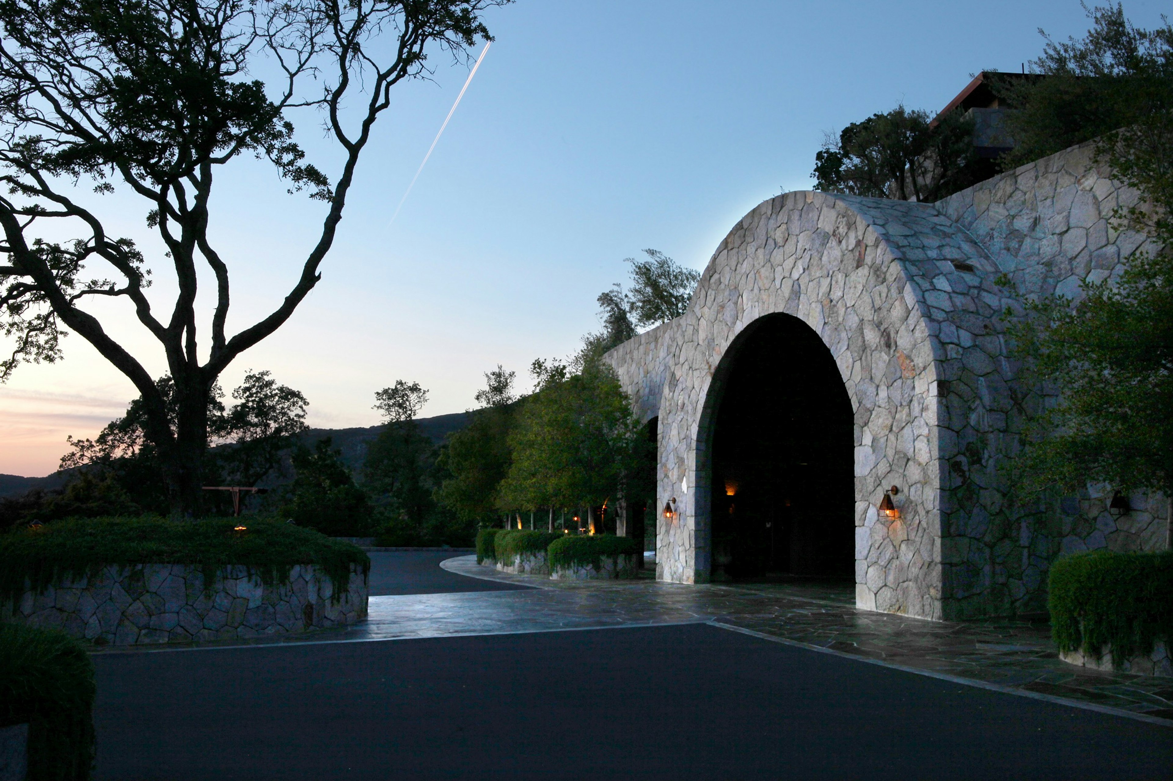 A stone arch in an outdoor setting