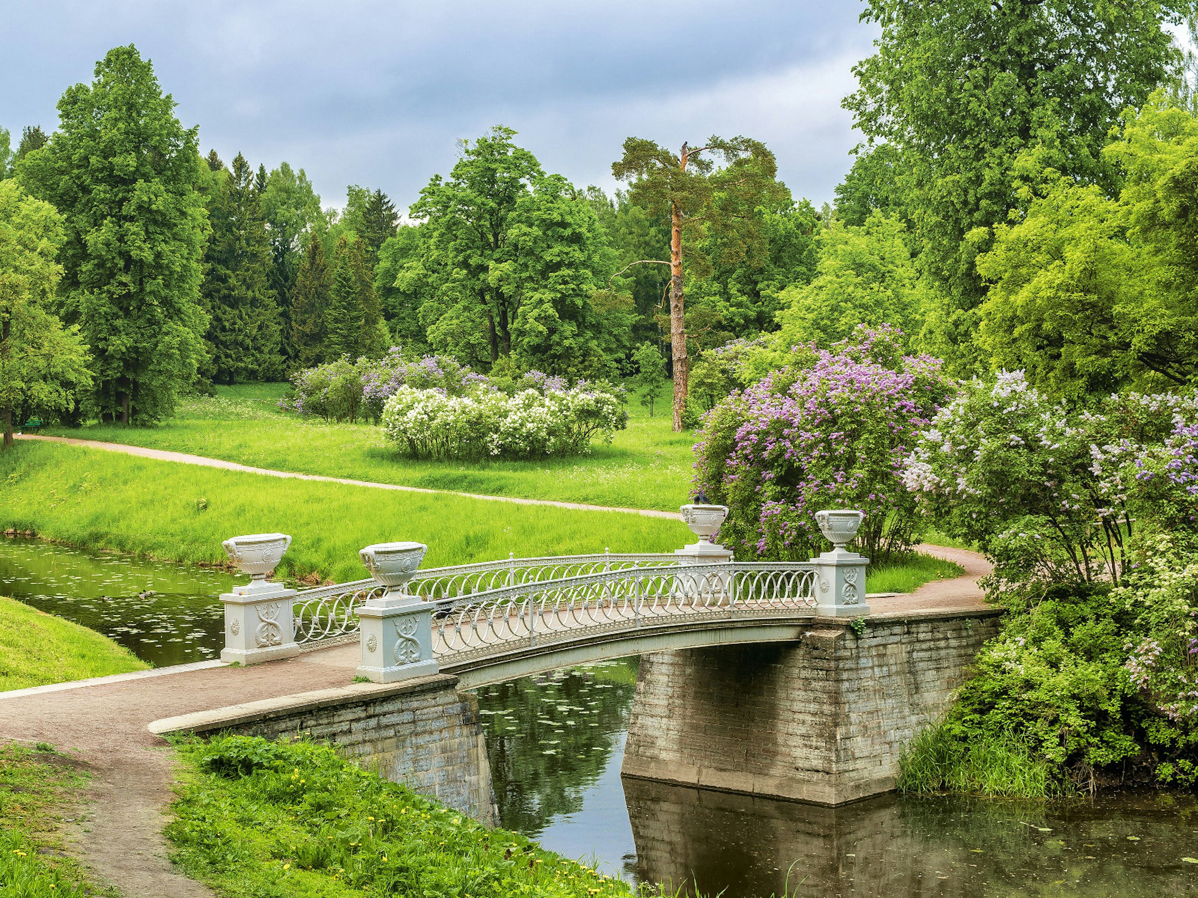 The Cast Iron Bridge in luscious Pavlovsk Park, home to the former residence of emperor Paul I © Andrew Koturanov / Shutterstock