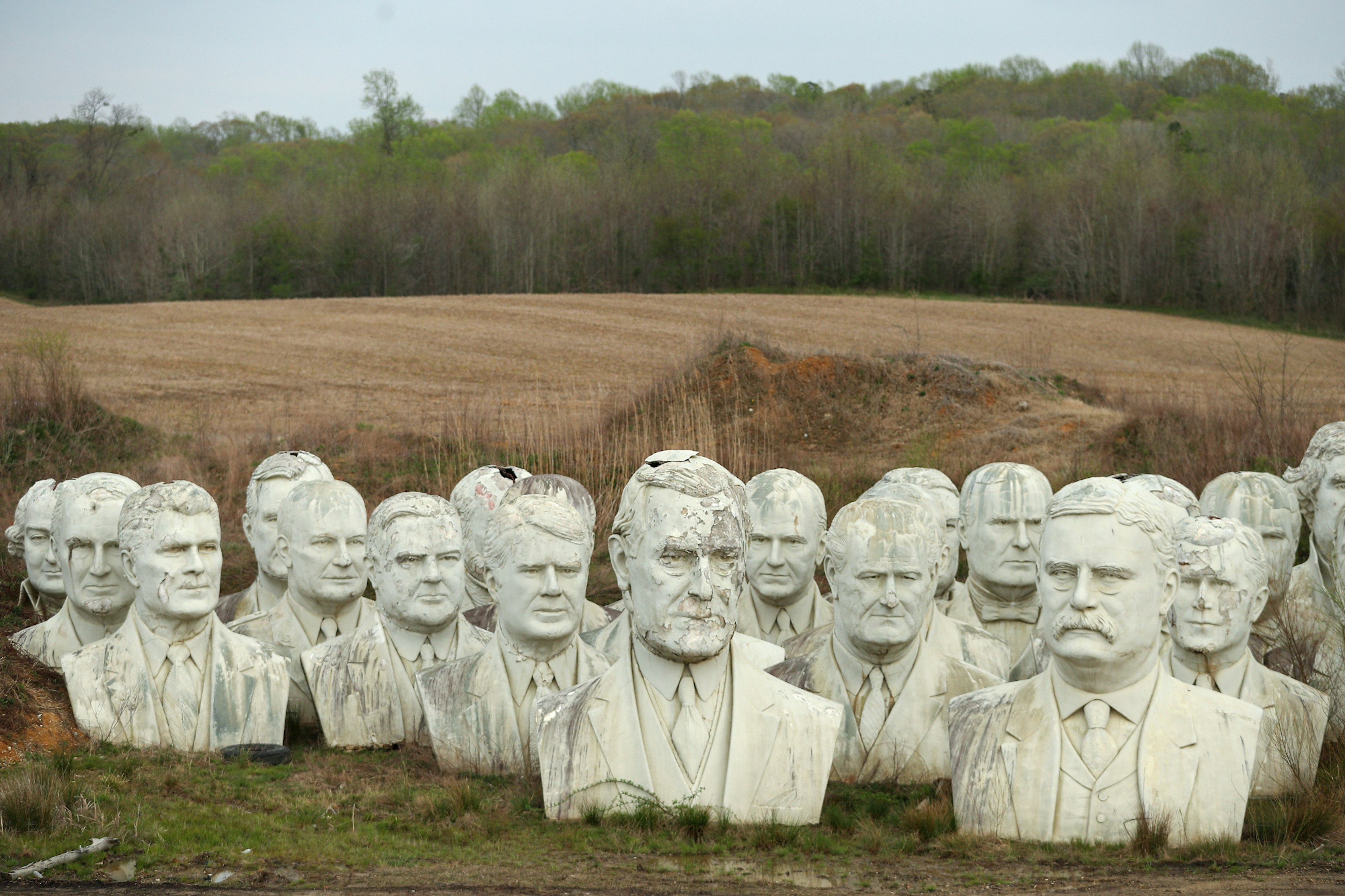 Twenty foot busts of former US Presidents' heads at Croaker. Teddy Roosevelt is visible centre-right.