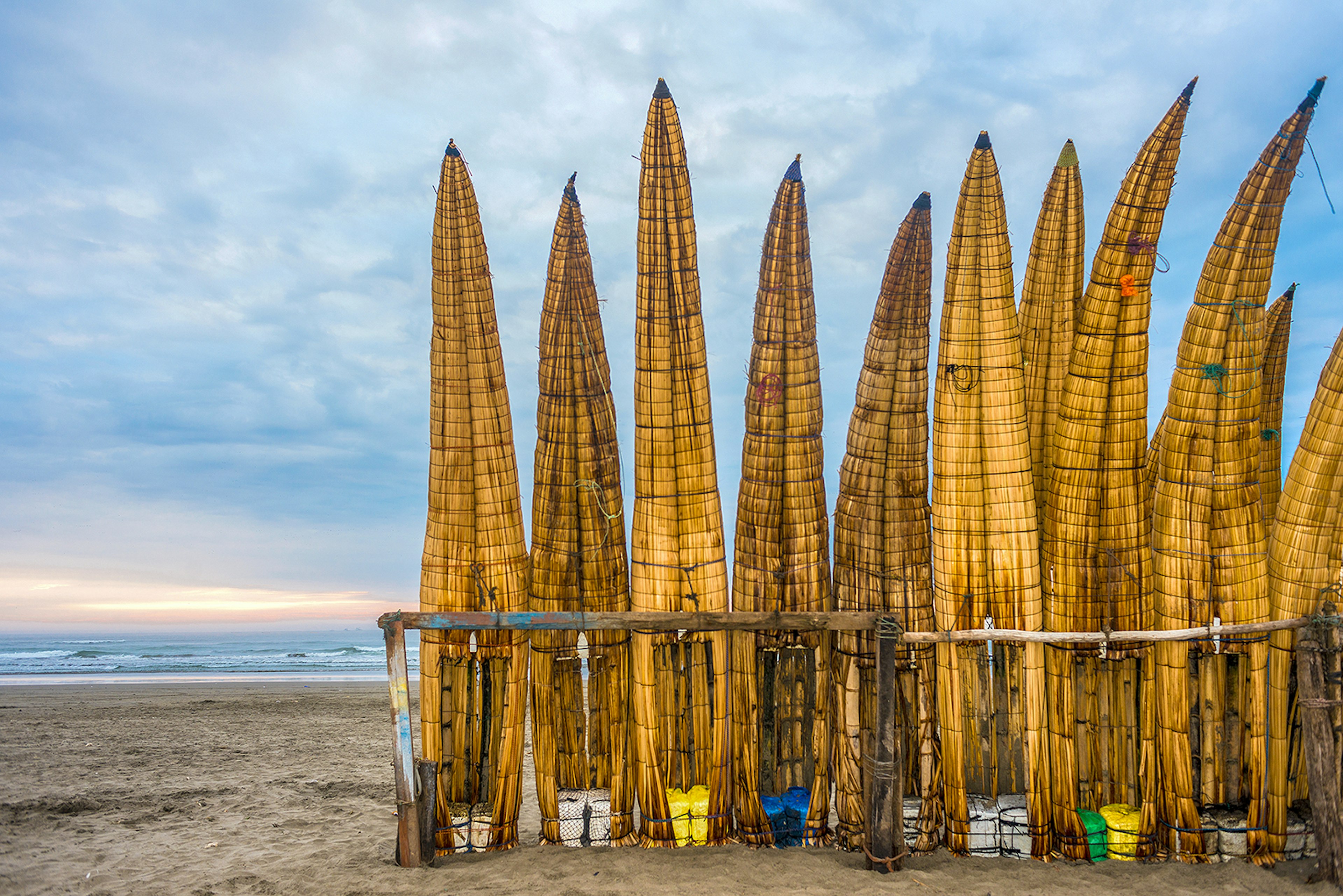 Traditional Peruvian small Reed Boats (Caballitos de Totora), straw boats still used by local fishermen in Peru