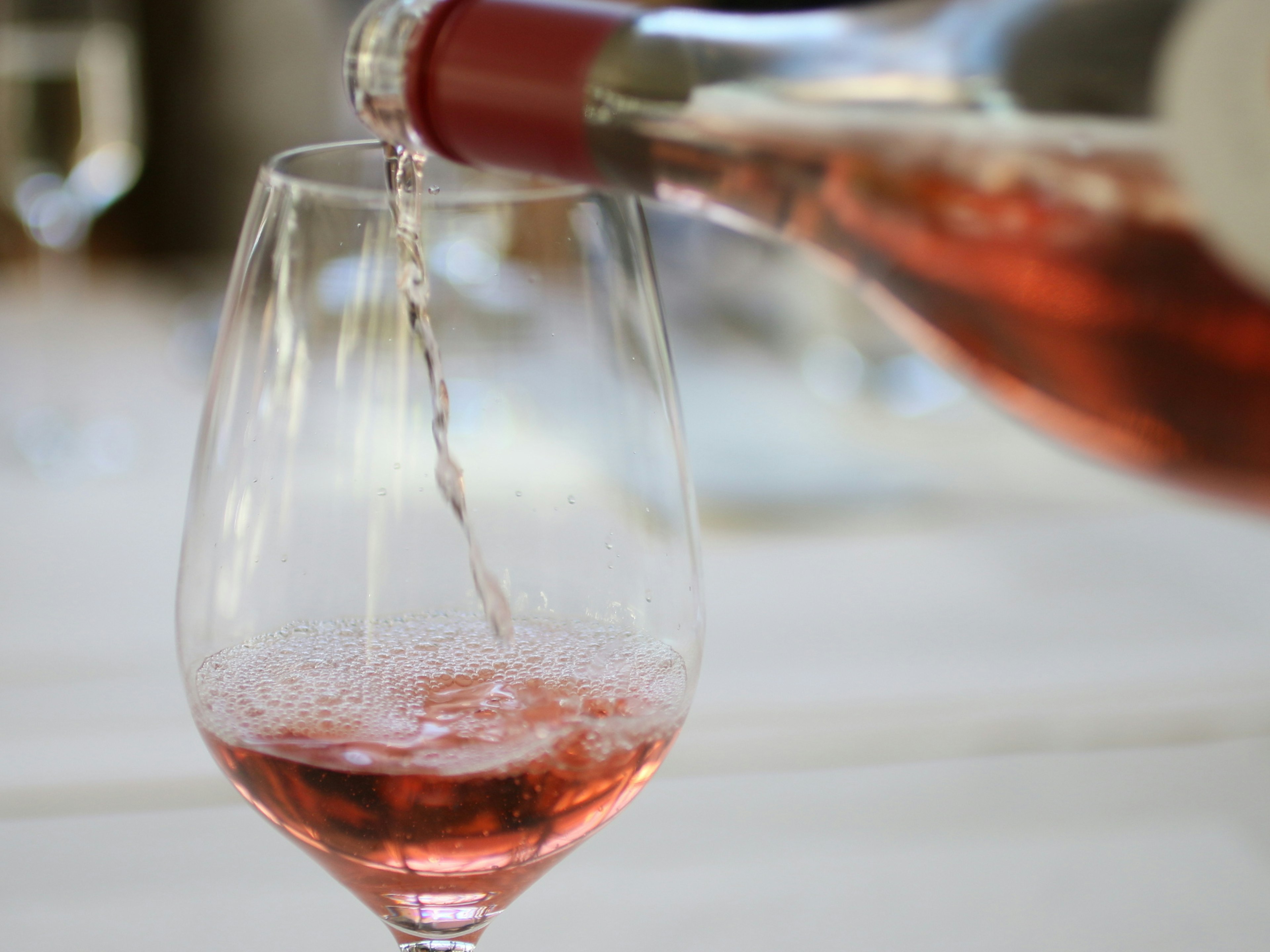 Pouring a glass of rosé wine