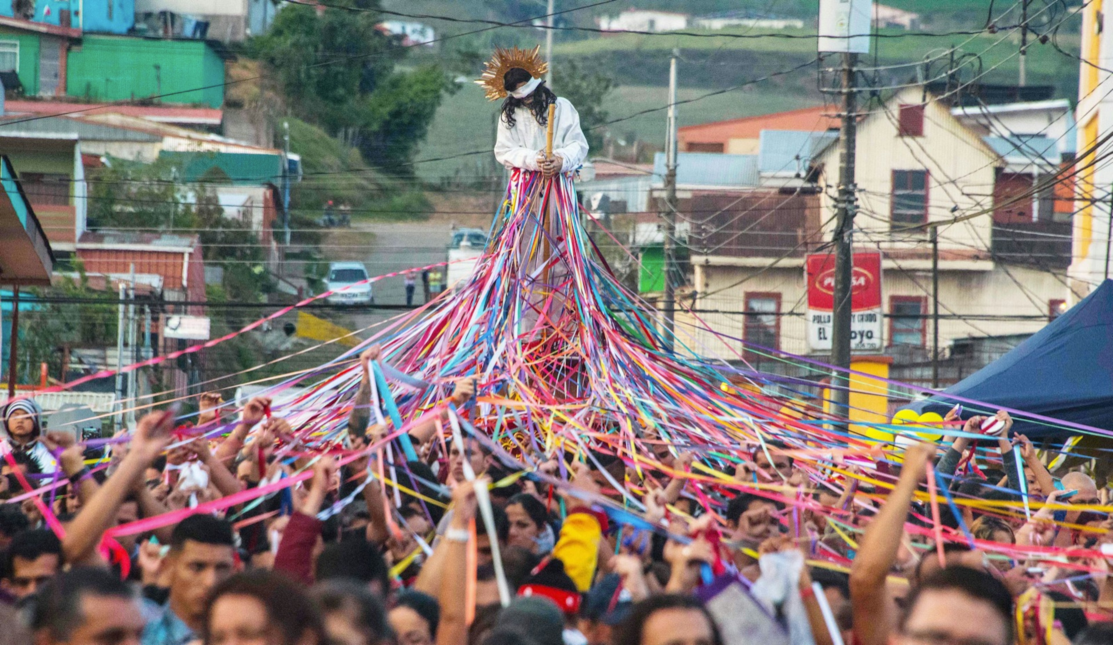 Catholics carry a statue of Jesus, during a procession known as Jesus Nazareno of the tapes, during Holy Week in San Jose.