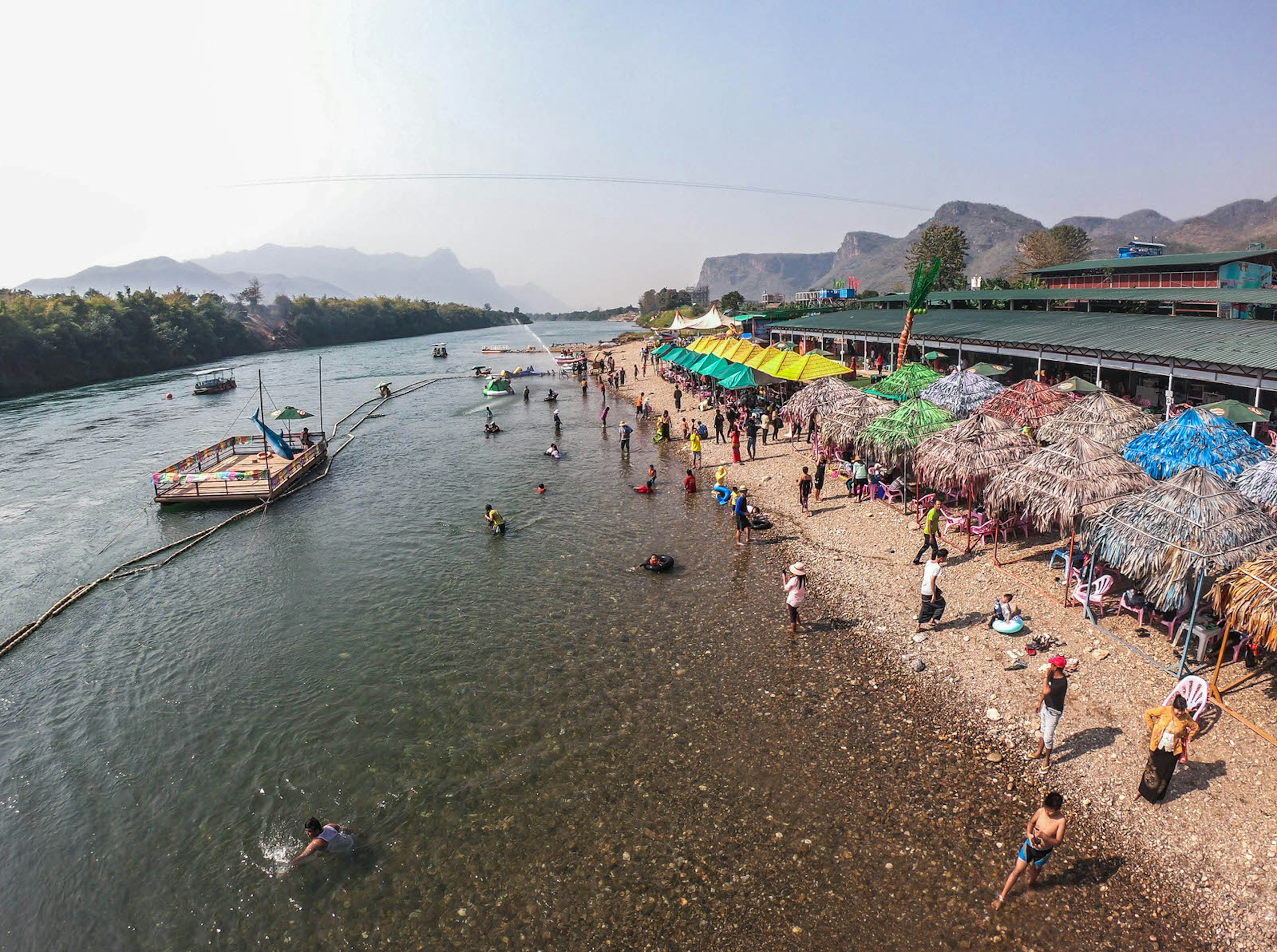 The view over Seven Mile Beach takes in stalls, boats and the Dotehtawaddy River