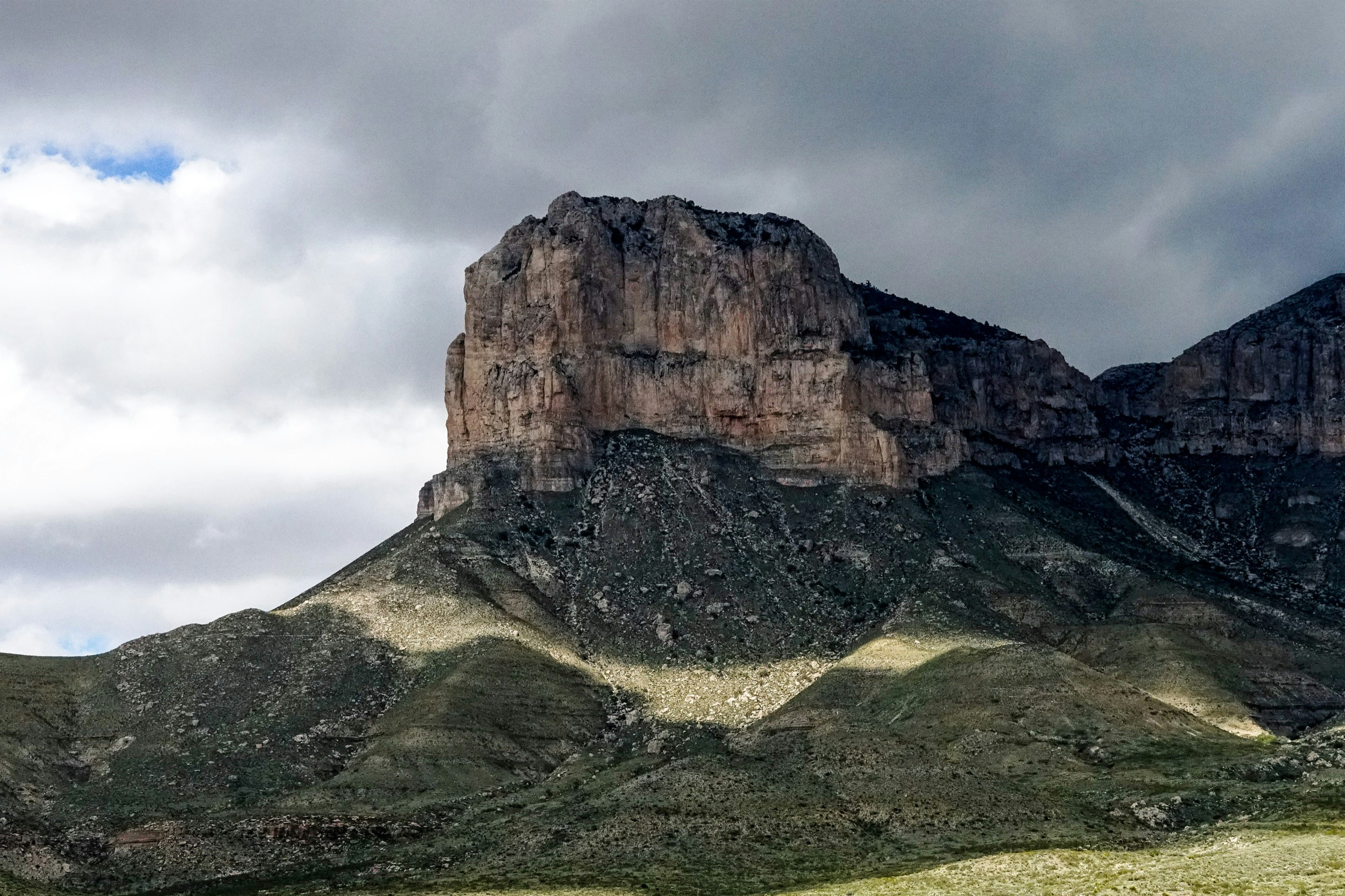 A mesa rises from lush surroundings in Guadalupe Mountains National Park in Texas