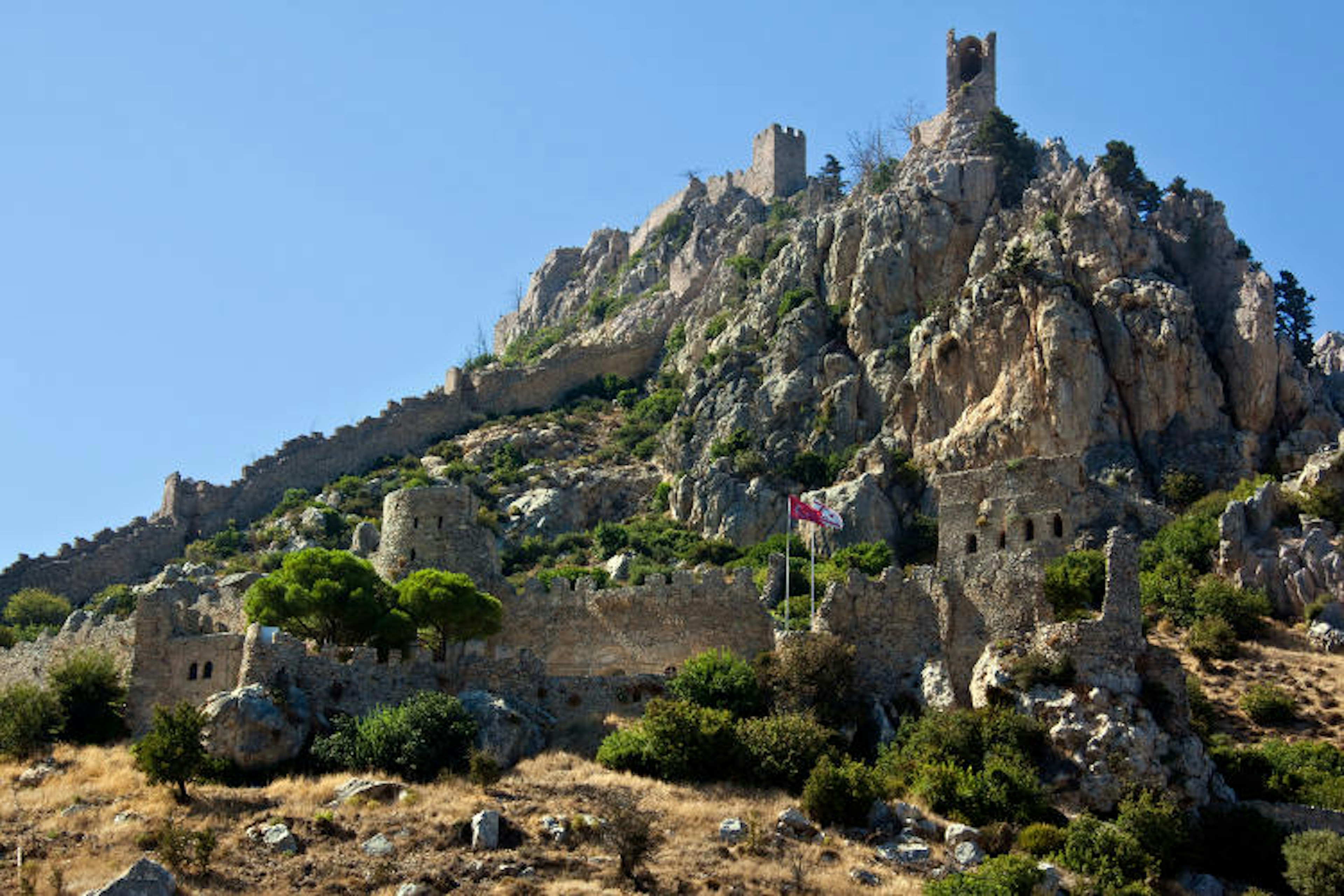 The fairytale outline of medieval St Hilarion Castle. Image by Steve Allen / Getty Images