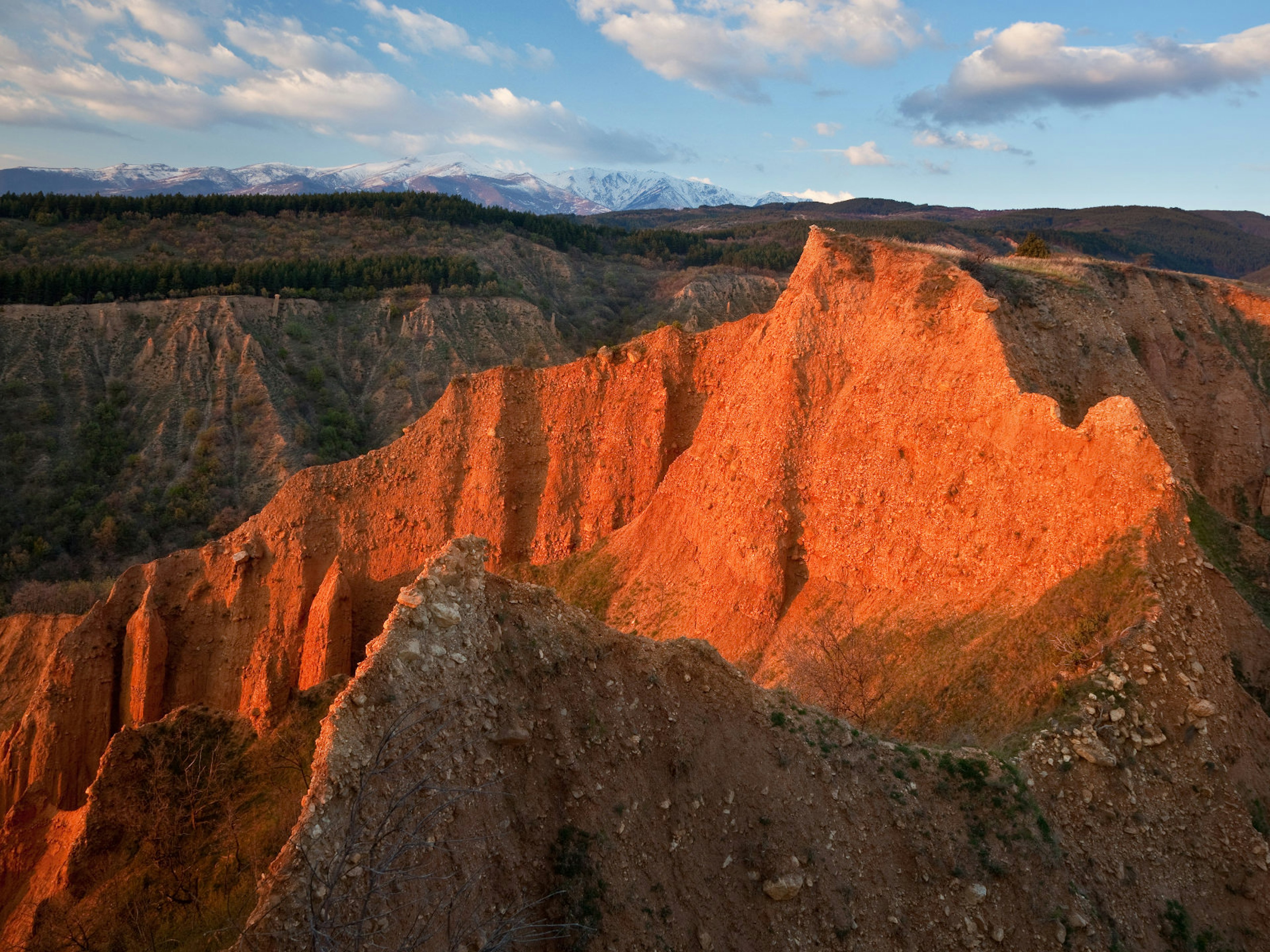 The orange sandstone of Stob pyramids at sunset