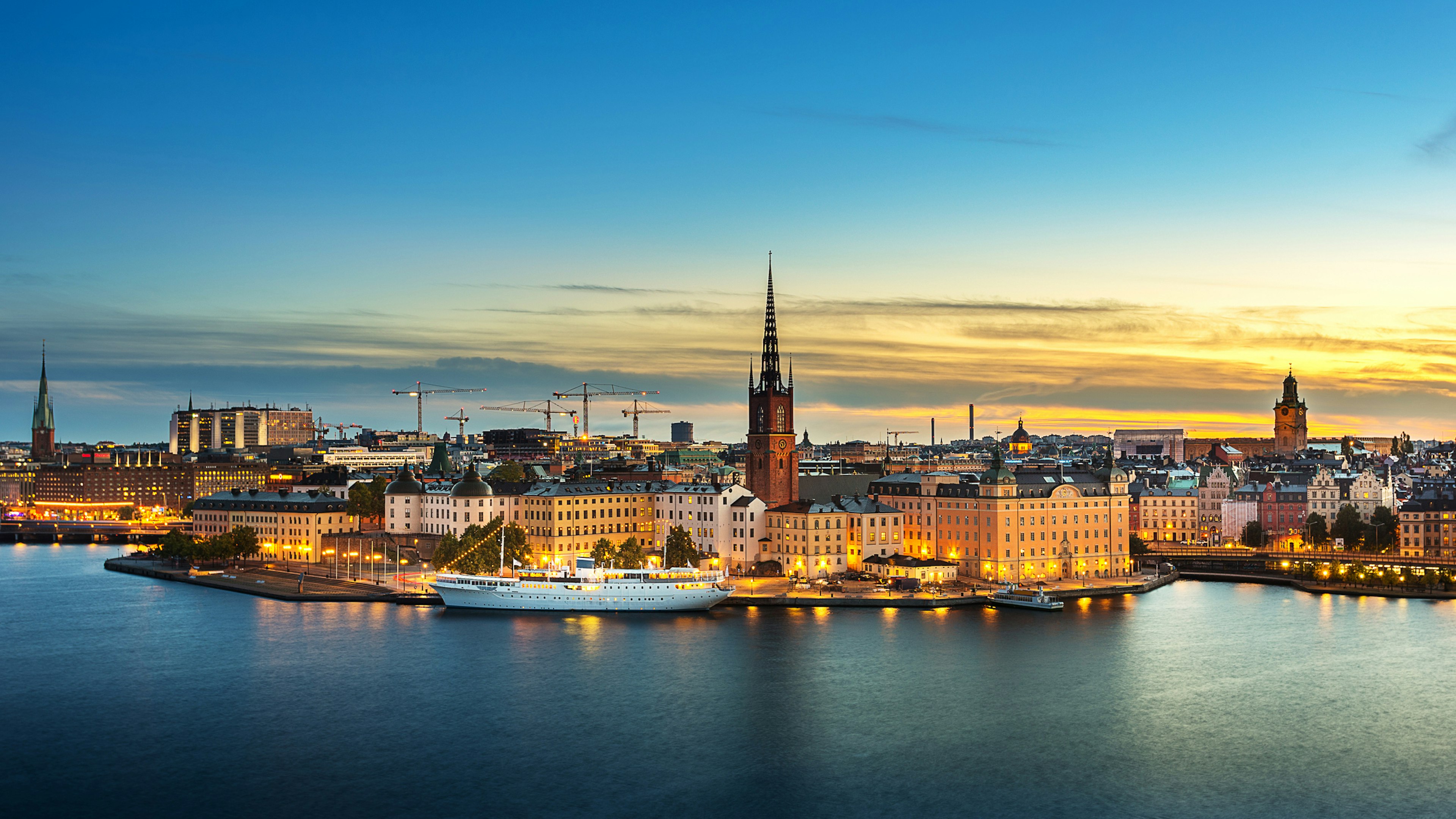 Sunset over Riddarholmen chruch in old town Stockholm city, Sweden -.jpg