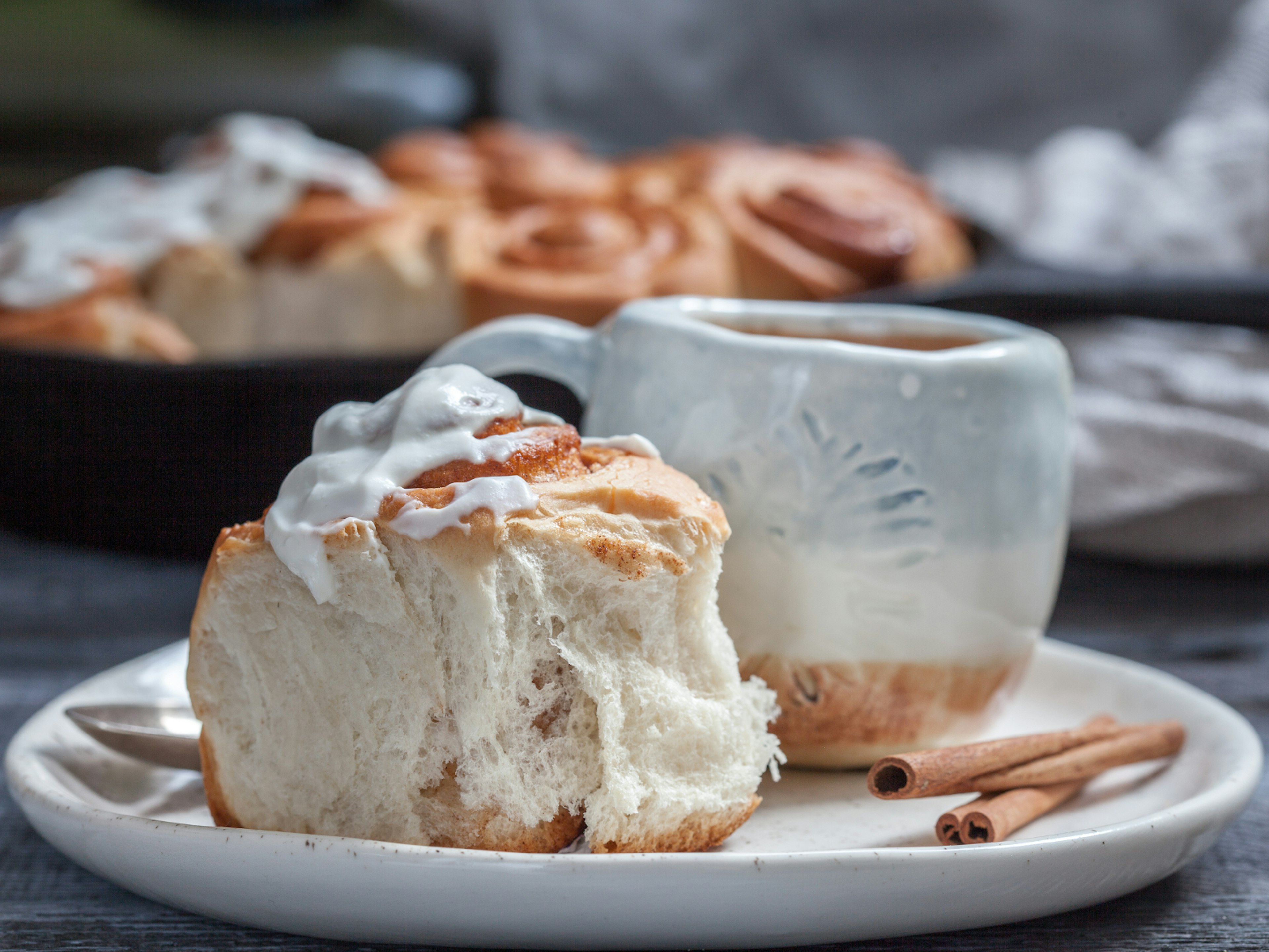 A cinnamon roll and a cup of coffee in Sweden