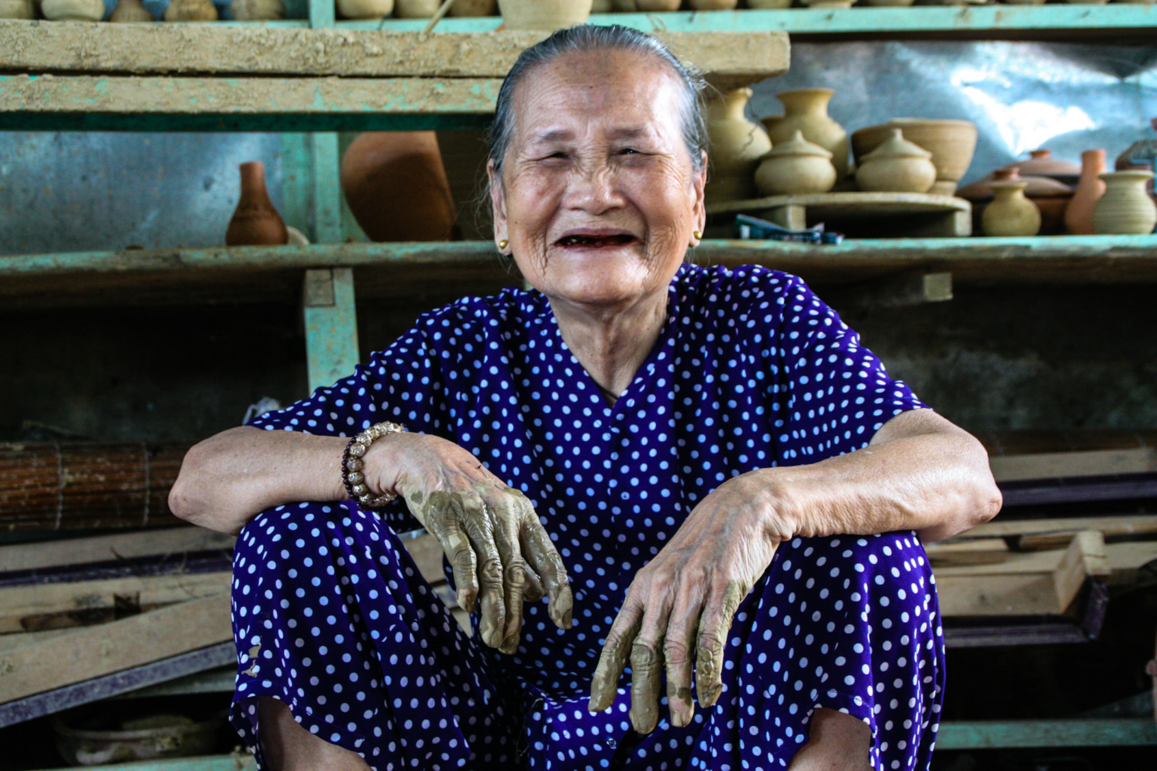 Portrait of Mrs Phu who still throws pottery in Thanh Ha Village, near Hoi An