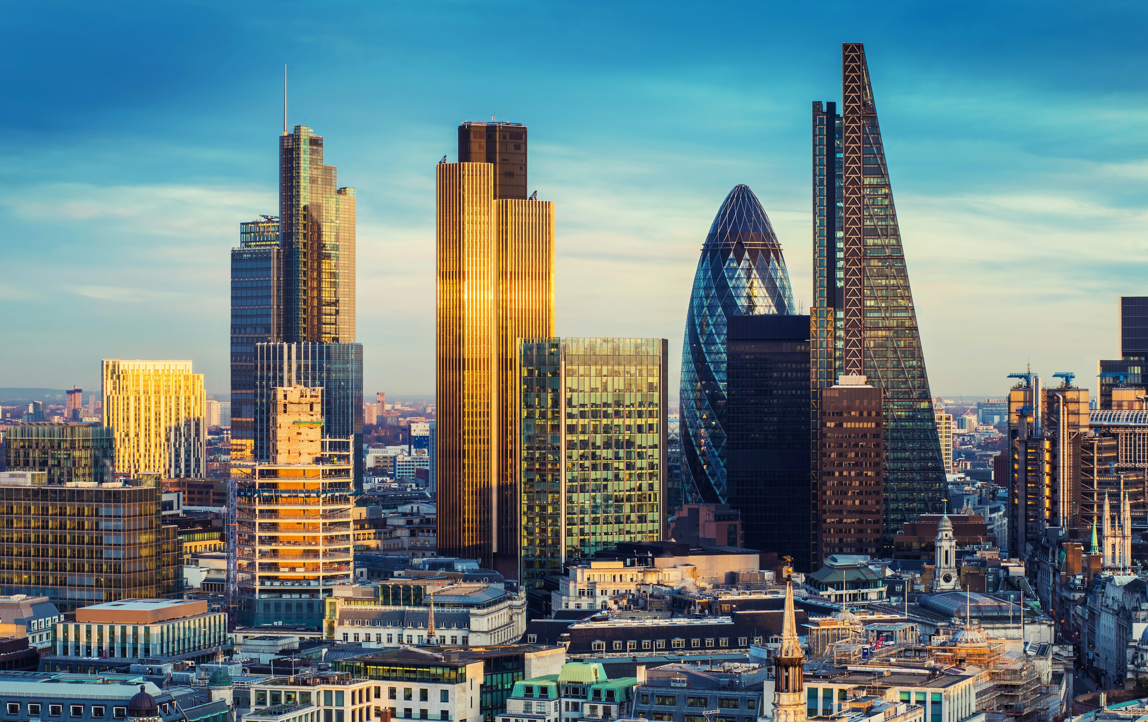 The bank district of central London with famous skyscrapers and other landmarks just before sunset