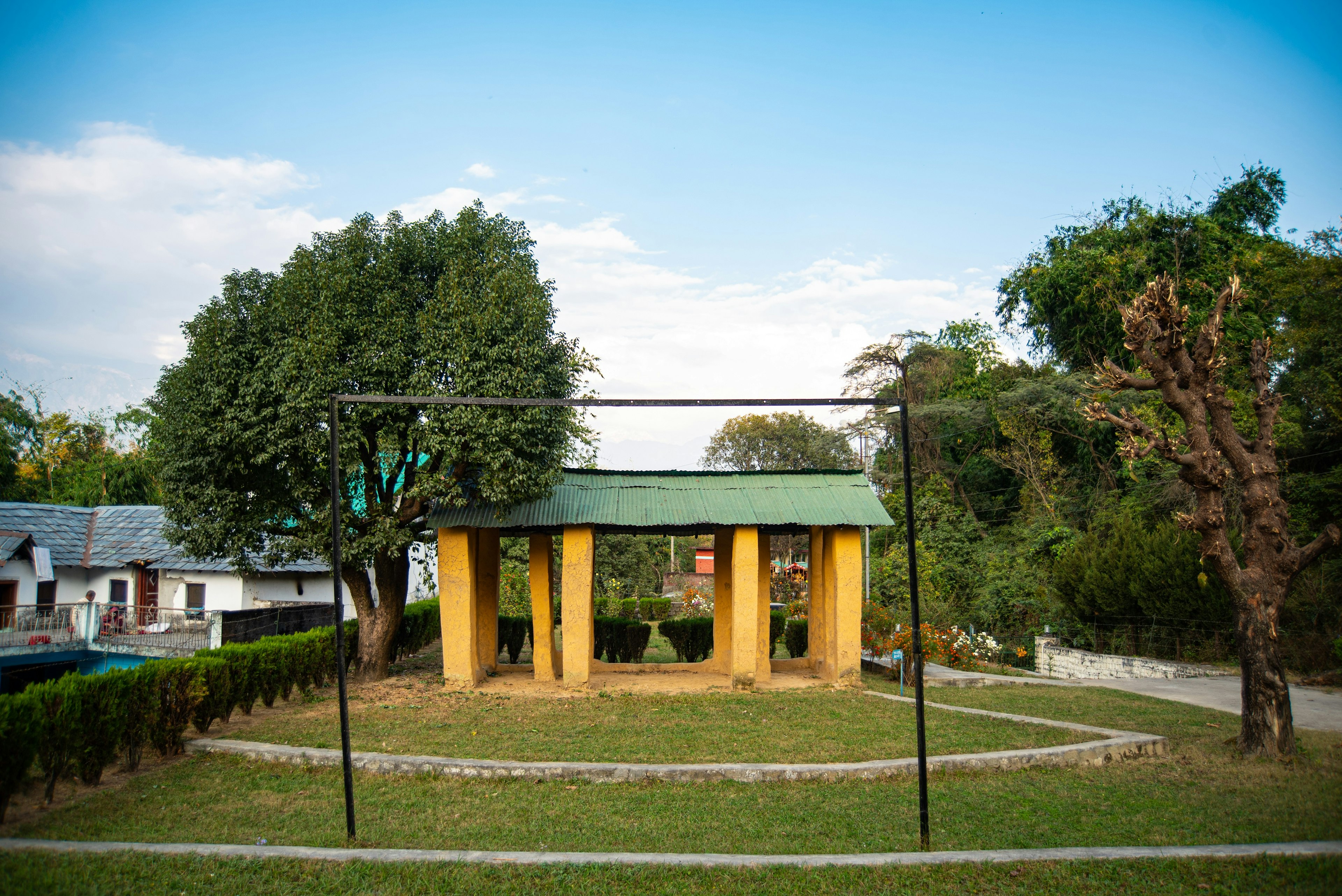 A view of the outdoor theatre in Andretta. The complex is small, comprising of a series of stone pillars with a small roof.