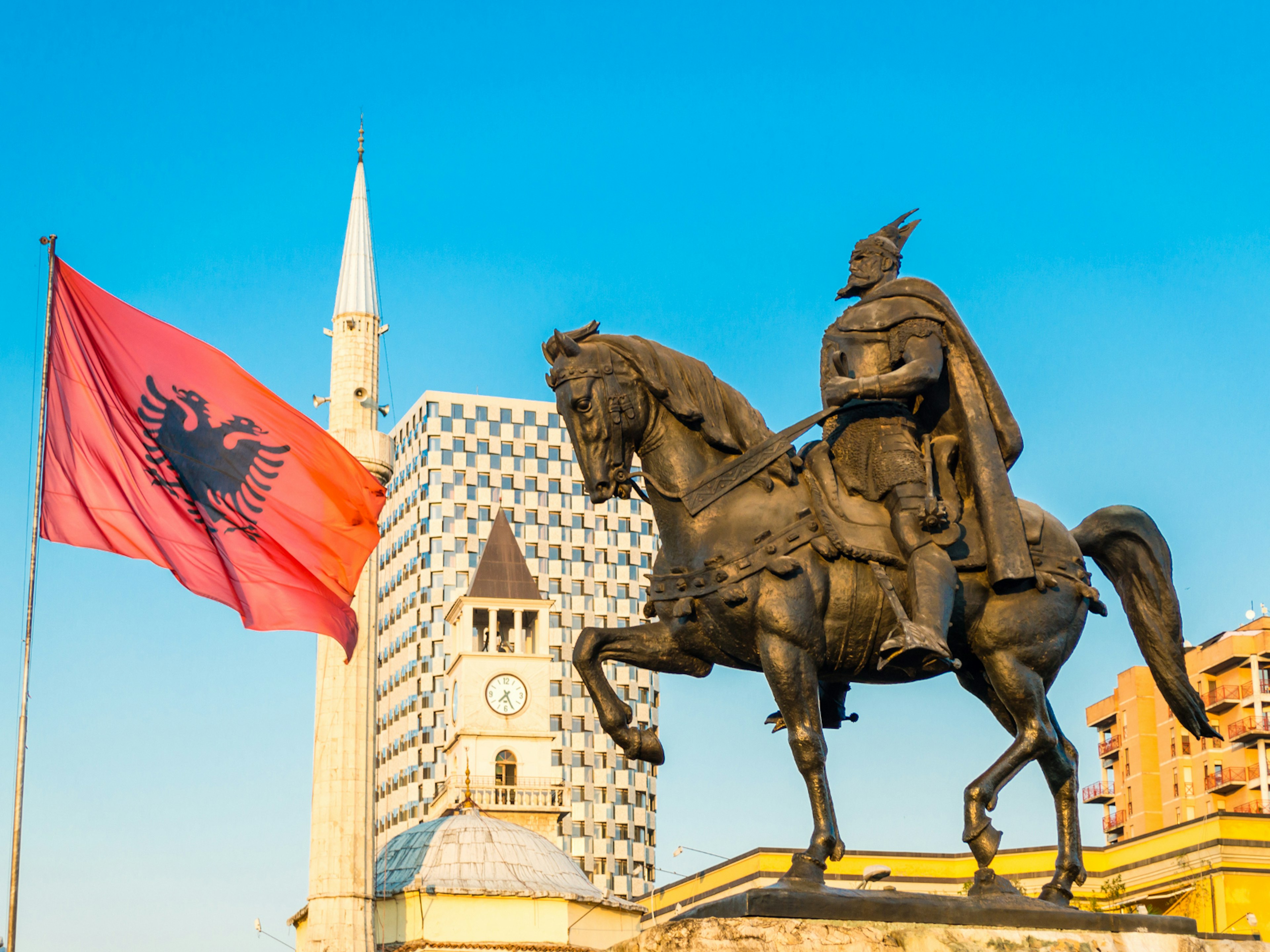 The Skanderbeg monument and Et'hem Bey Mosque dominate Tirana's central square © Andrii Lutsyk / Shutterstock