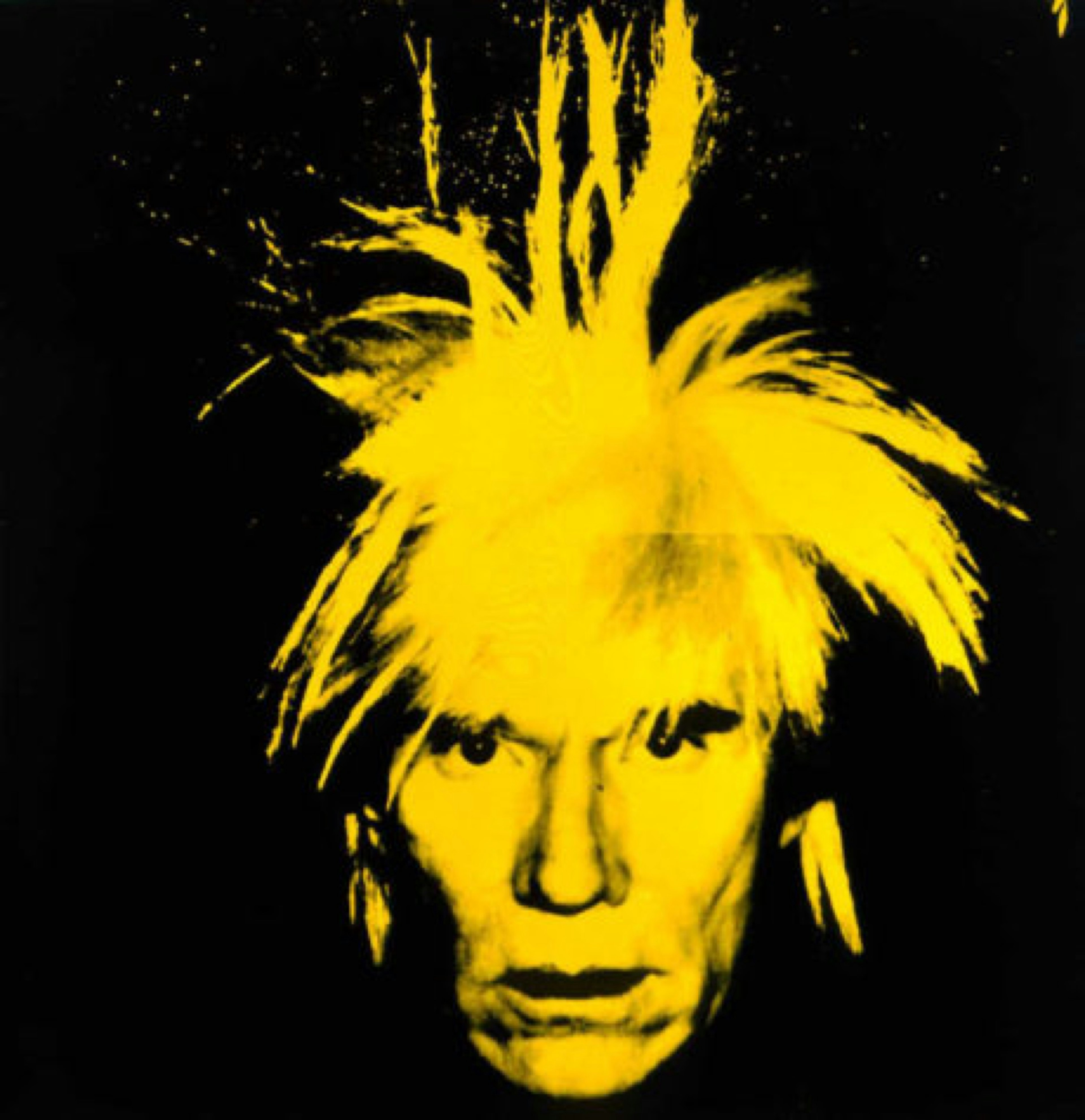 A yellow-hued Andy Warhol's hair stands on end, on a stark black background; Warhol in the US