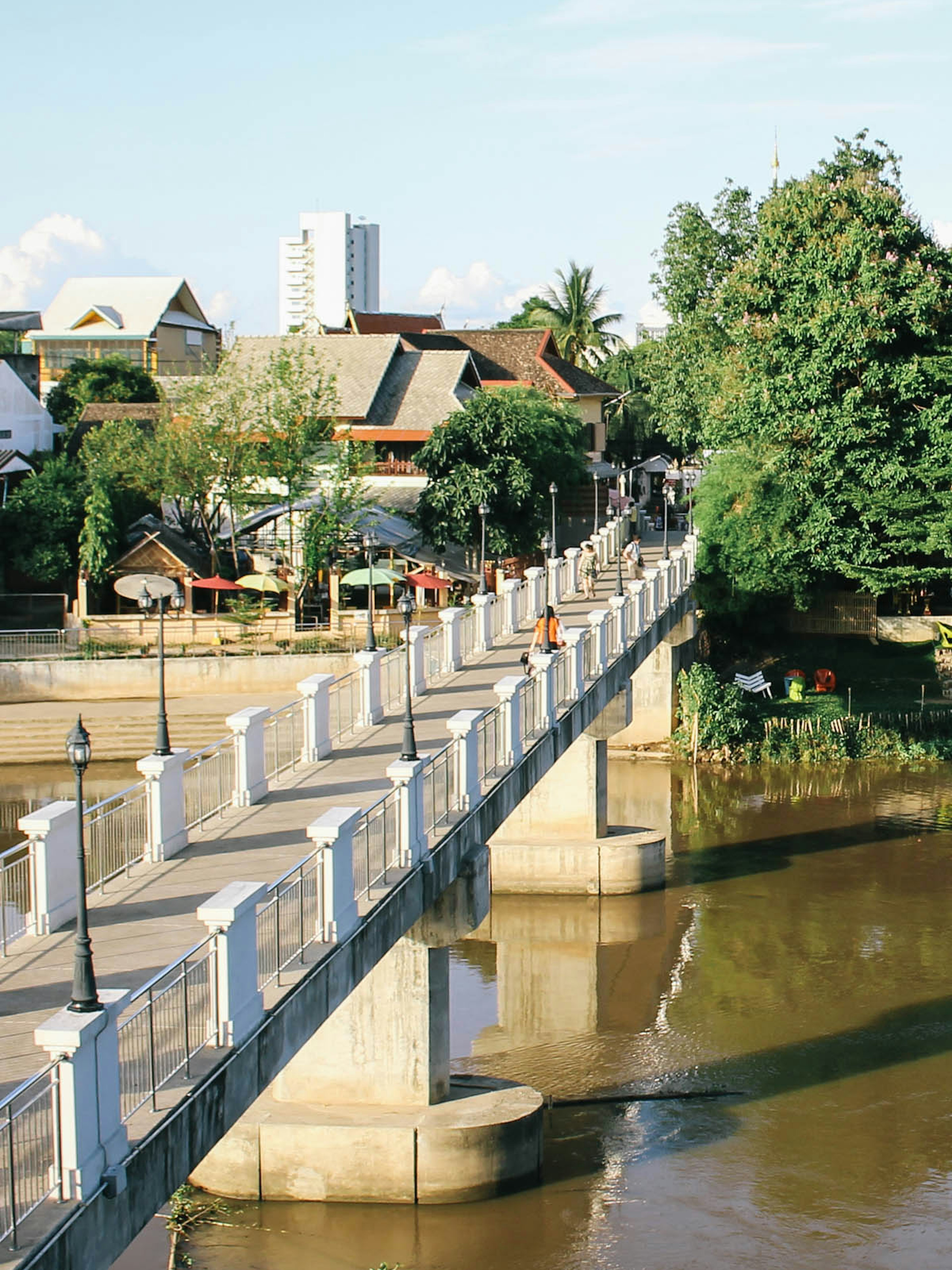 A pedestrian bridge in Wat Ket, a riverside district in Chiang Mai © Alana Morgan / iBestTravel