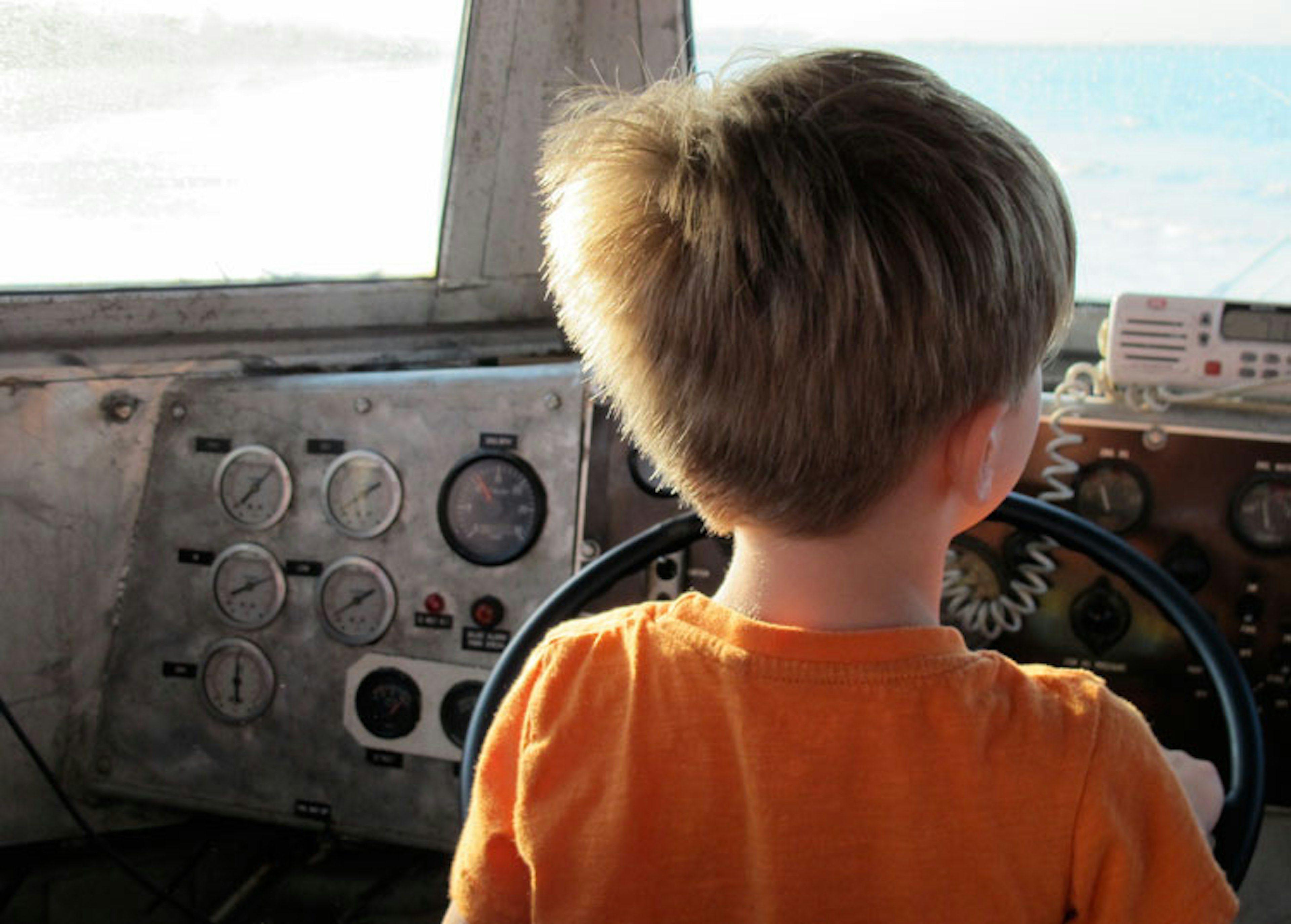 Distractions aplenty are key to a successful road trip with kids - but yielding control of the steering wheel is a last resort. Image by Tom Spurling / Lonely Planet.