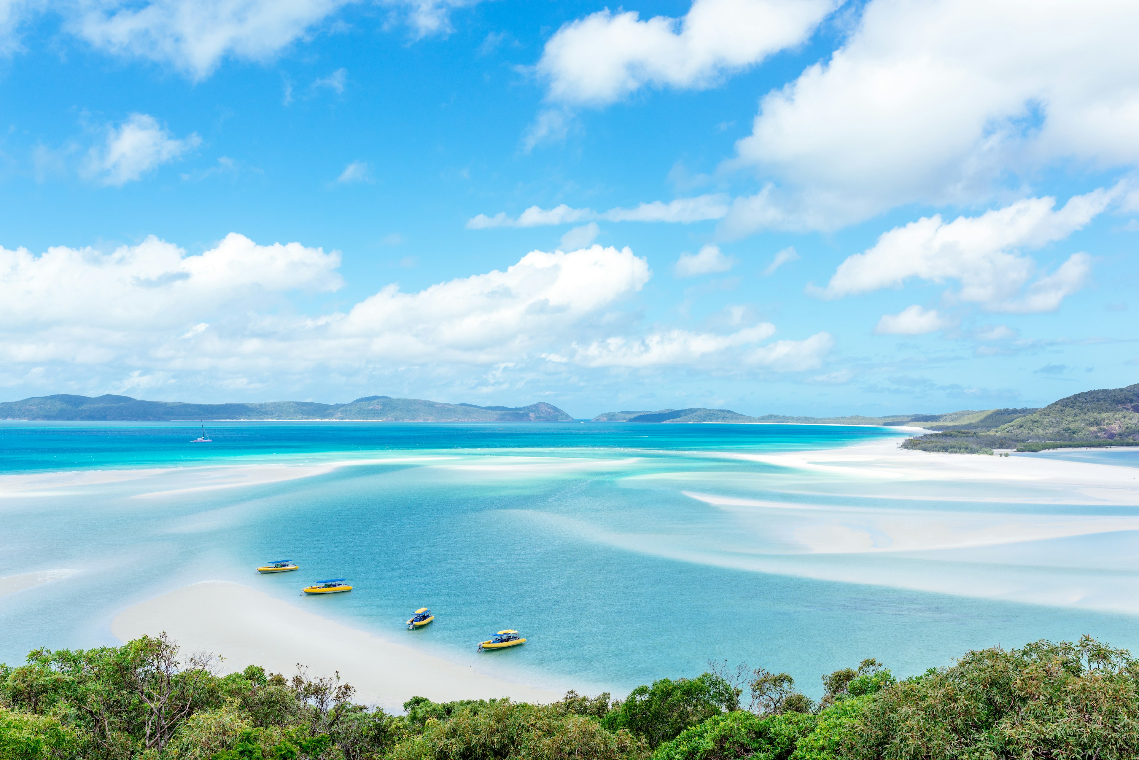 Whitehaven Beach stretching along Whitsunday Island, Australia.