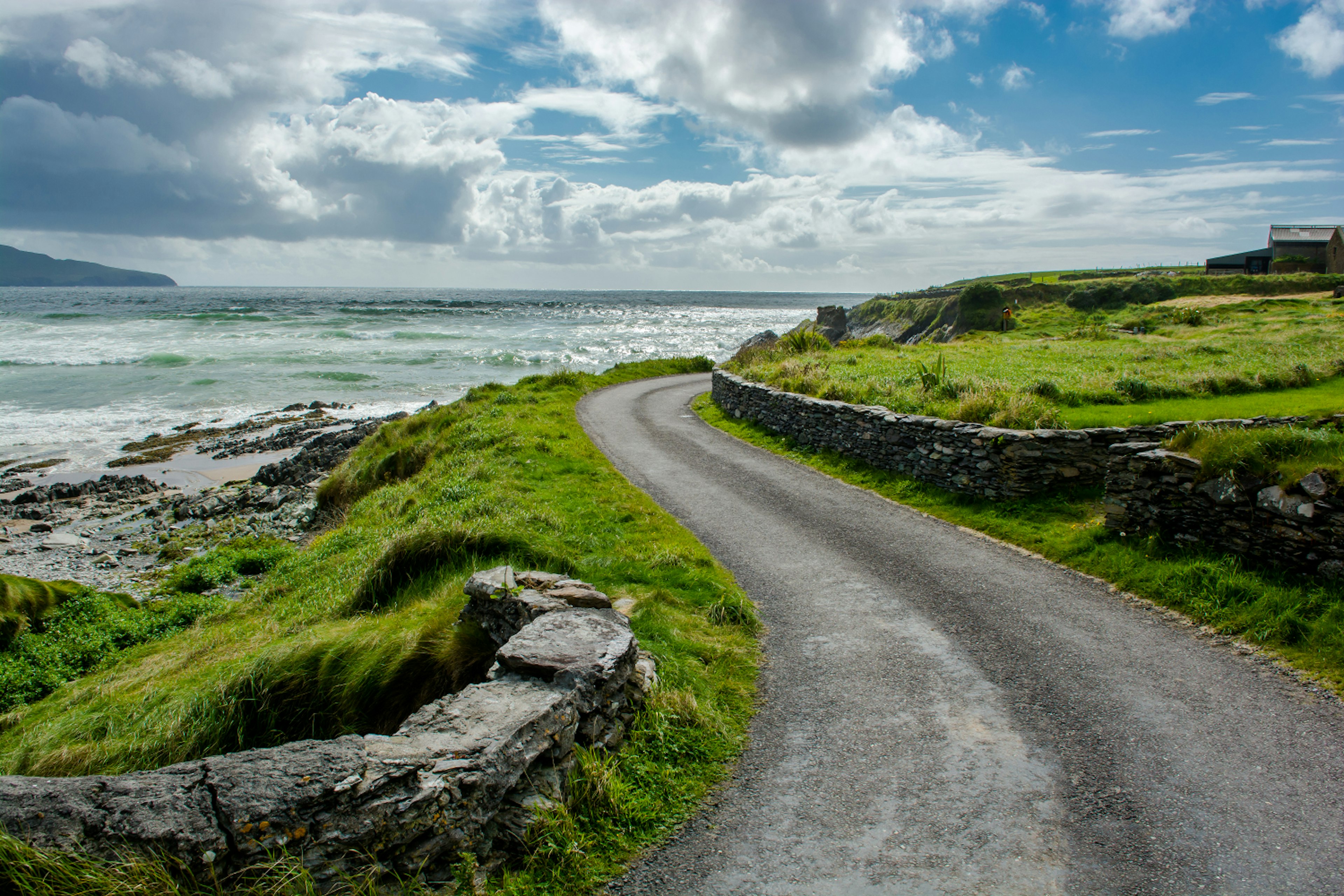 x-default
Surrounding Wall, Travel, Stone - Object, No People, Cloudscape, Remote, Coastline, Grass, Scenics, Curve, Journey, Loneliness, Solitude, Narrow, Direction, Vacations, Transportation, Nature, Rural Scene, Outdoors, Horizontal, Viewpoint, Northern Ireland, Dingle Peninsula, County Kerry, Peninsula, Beach, Coastal Feature, Horizon, Landscape, Cloud - Sky, Atlantic Ocean, Sea, Wave, House, Single Lane Road, Street, Road, Thoroughfare, Wild Atlantic Way