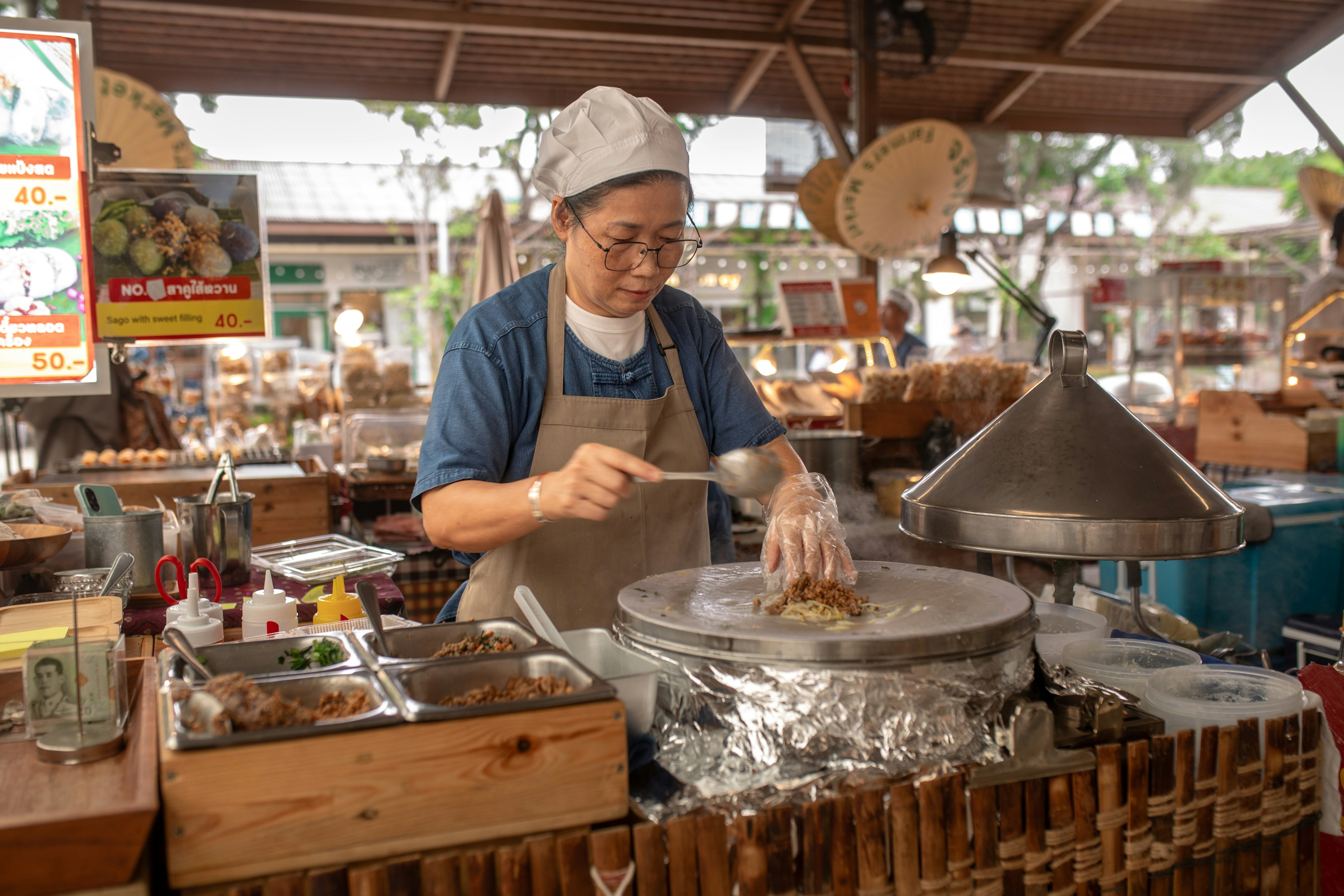 Eat on the streets in Thailand for a feast at a bargain price. Tanakrit Wattanasiri for Lonely Planet