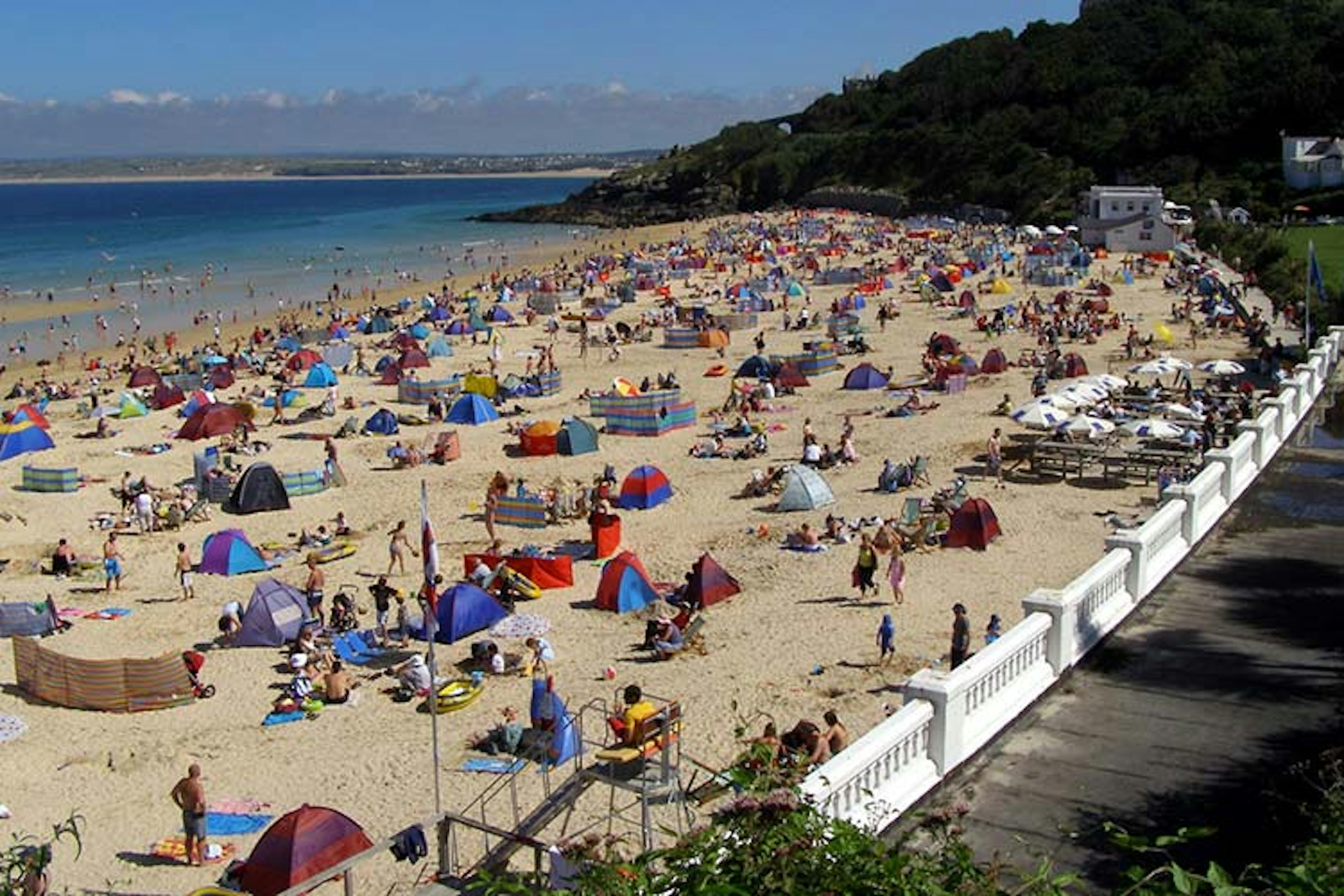 Crowded beaches can be great places to people-watch - but please don't be creepy. Image by Jim Champion / CC BY-SA 2.0.