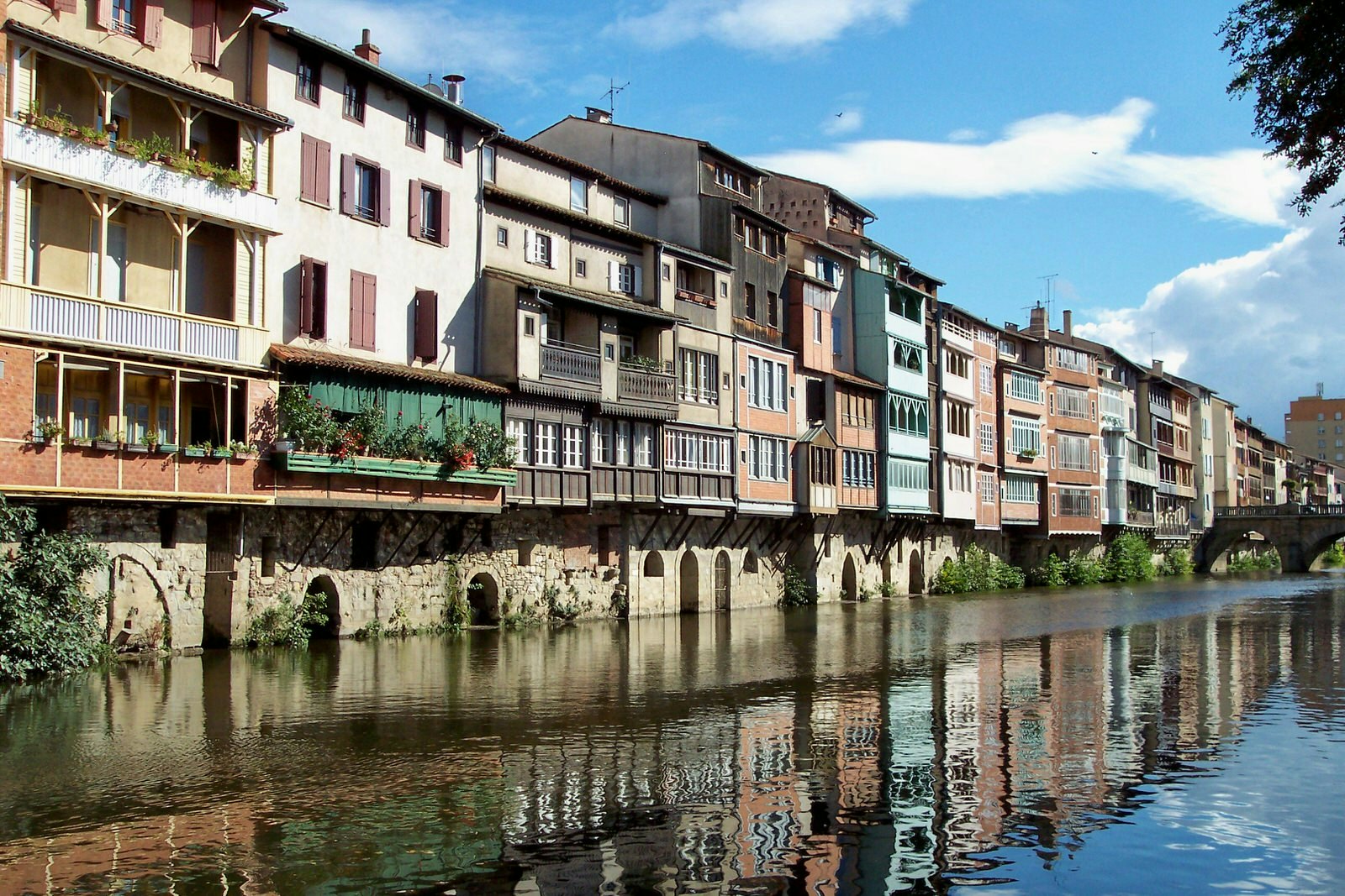 Tarn travel - Brightly painted tanneries lining the Agout river in Castres, in France's Tarn region