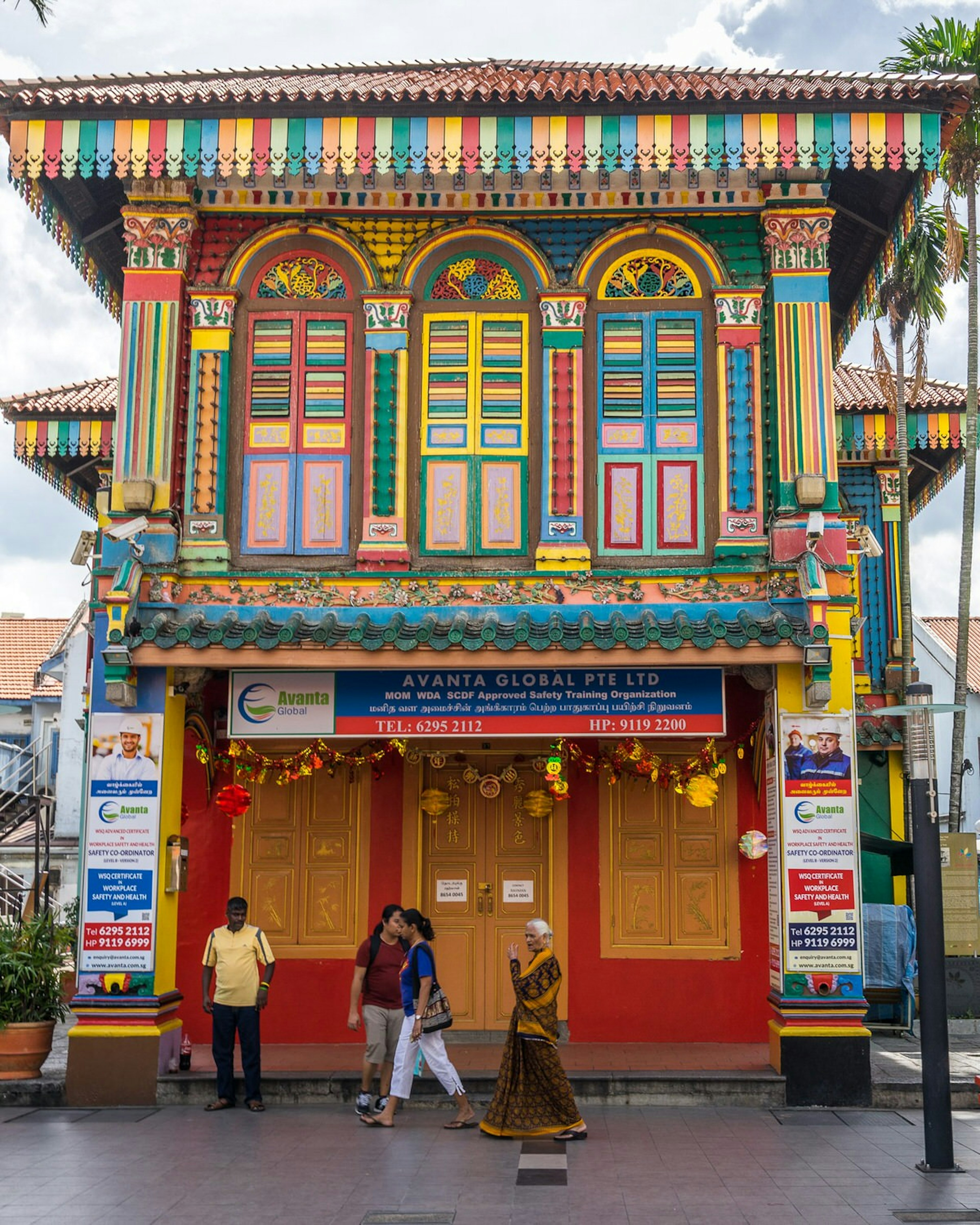 A brightly painted, multicoloured building in Little India, Singapore © Alex Cimbal / Shutterstock