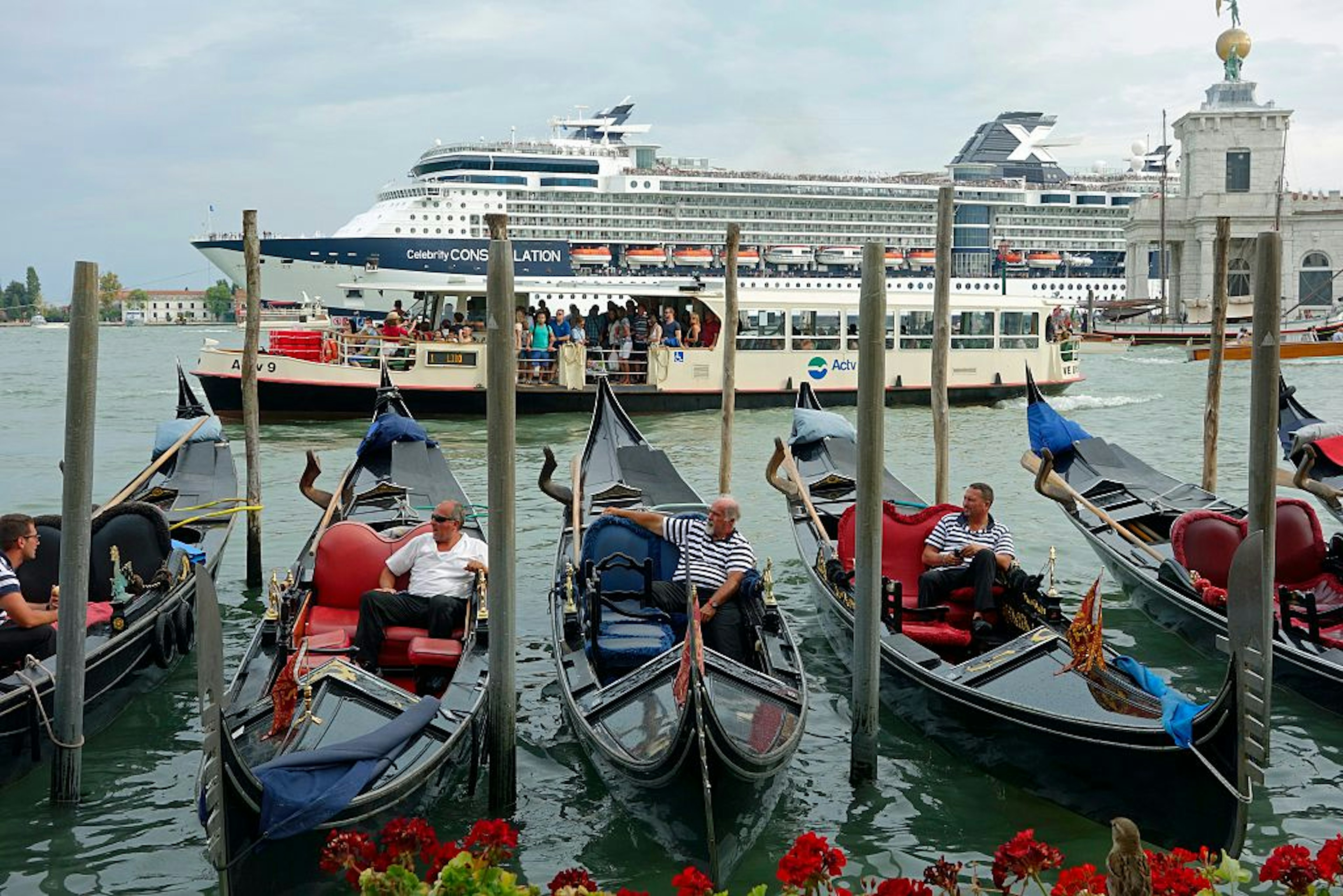 Different Vessels in Venice Harbor. (Photo by: Education Images/UIG via Getty Images)
4004_14_3785_vessels
Vessels Ship Boats Gondolas Cruise Ship Vaporetto Gondoliers Life Boats Passengers Travel Water Travel Tourists Outdoors Daytime People Crowd Horizontal Color Image Venice Italy Europe