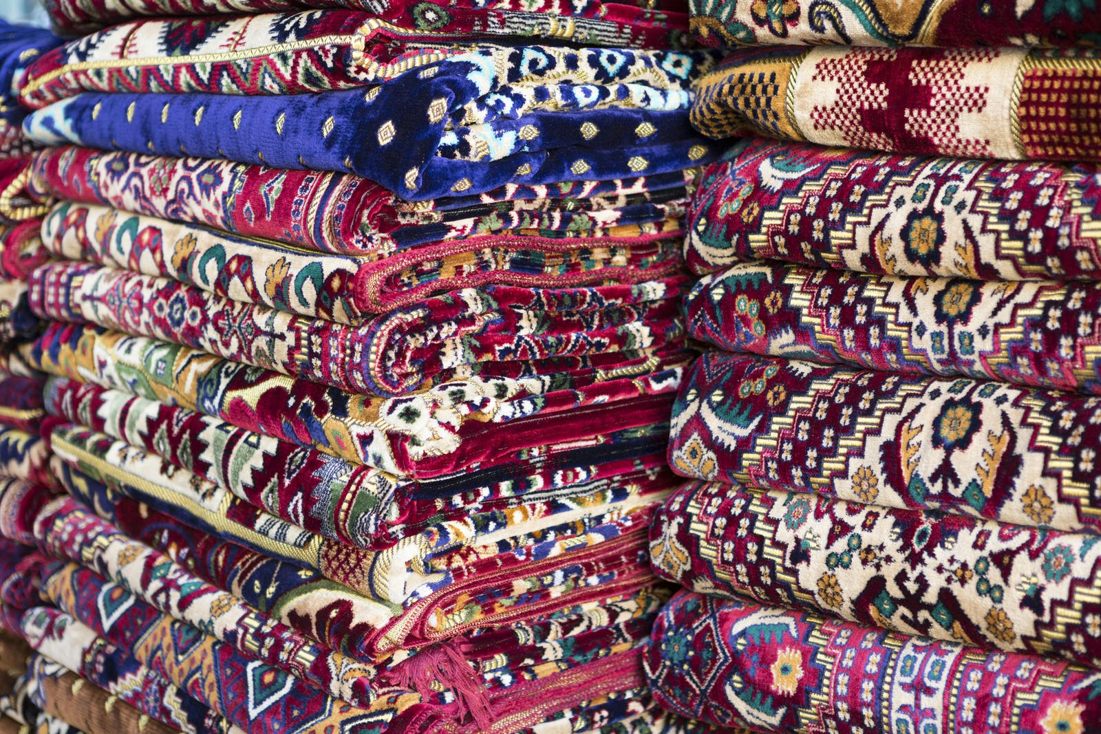 Carpets and prayer mats for sale in the Deira souq, Dubai, United Arab Emirates